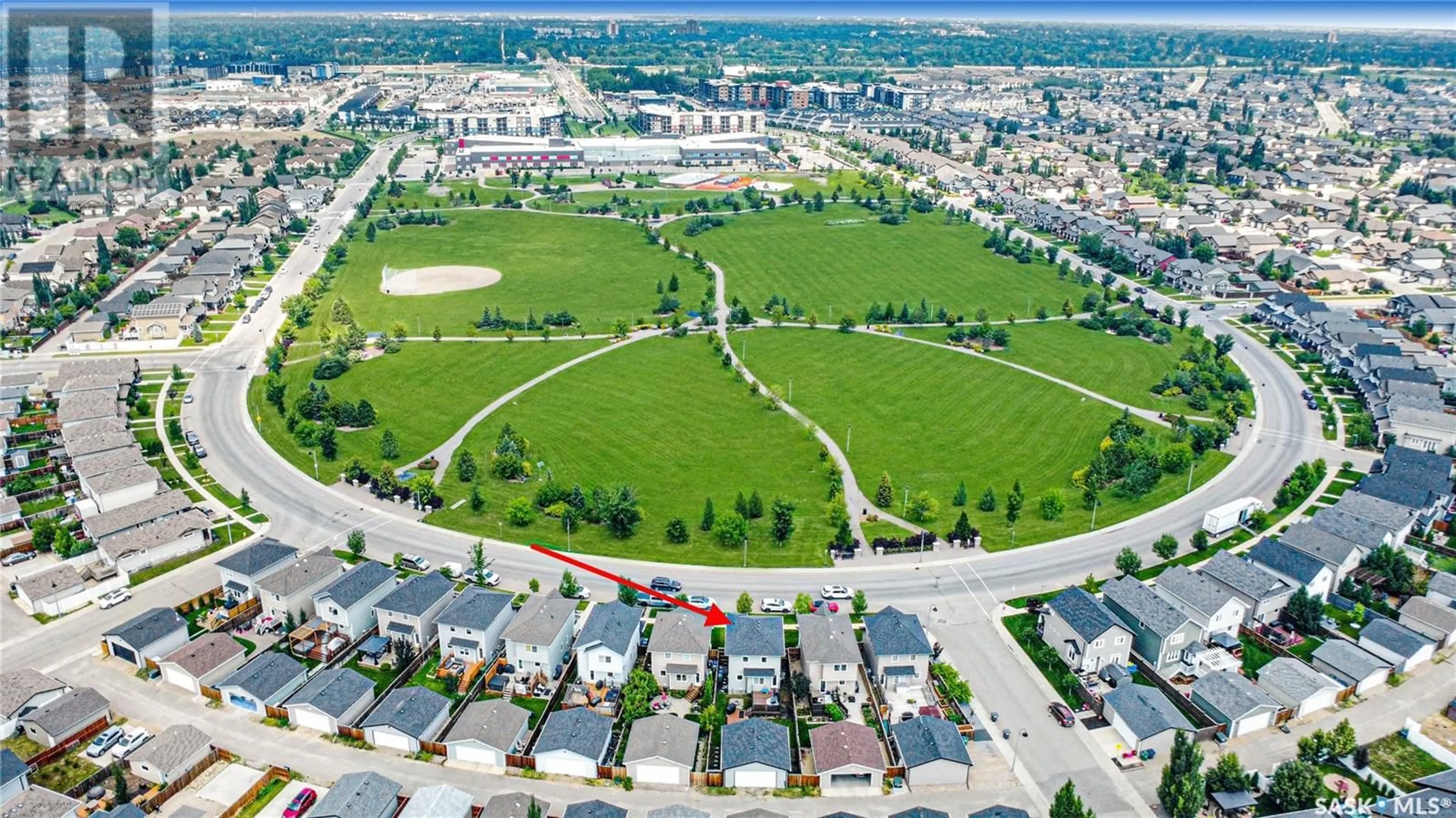 A pic from outside/outdoor area/front of a property/back of a property/a pic from drone, street for 534 STONEBRIDGE COMMON, Saskatoon Saskatchewan S7T0N8