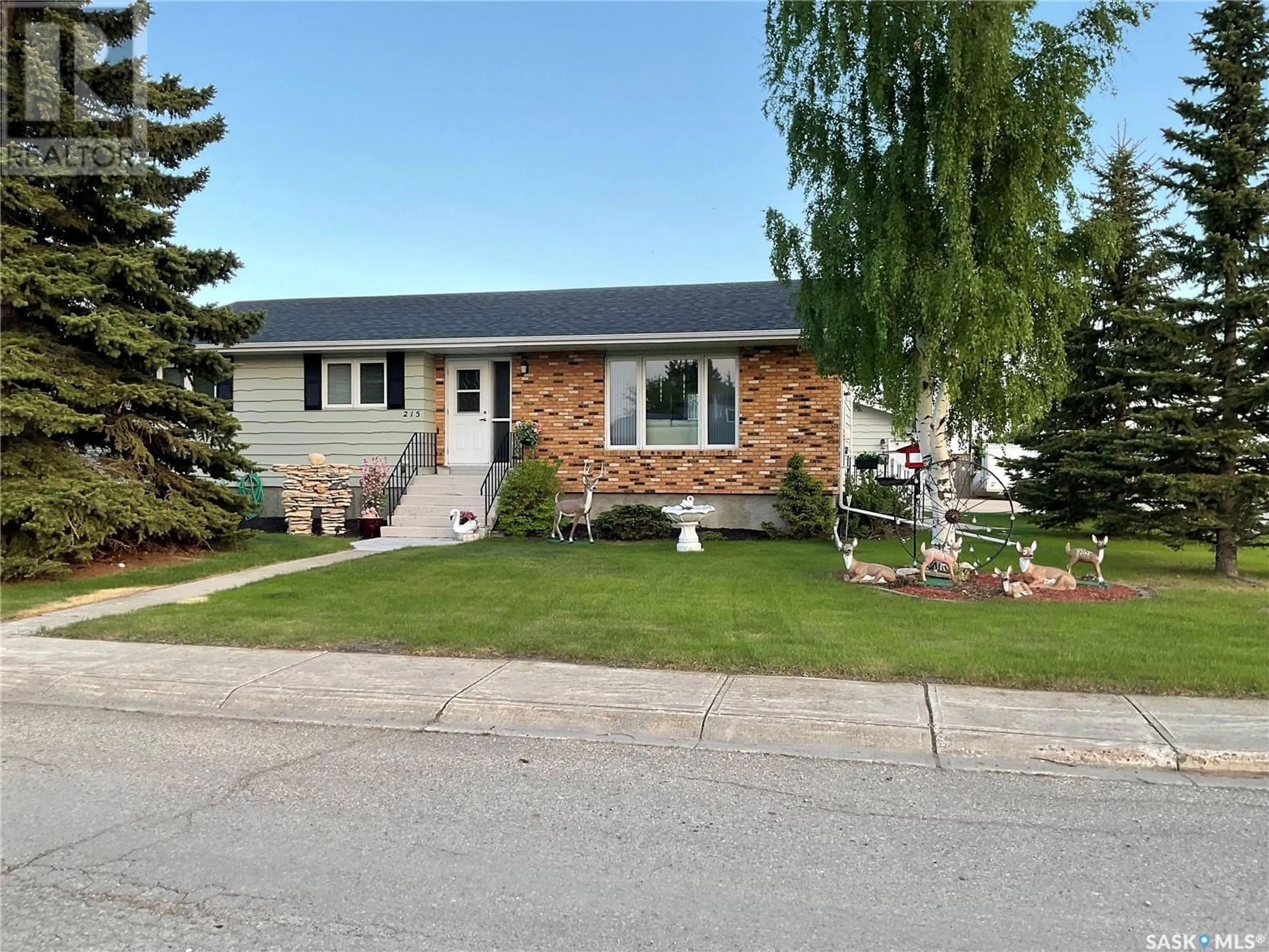 Home with vinyl exterior material, street for 215 7TH STREET, Wakaw Saskatchewan S0K4P0
