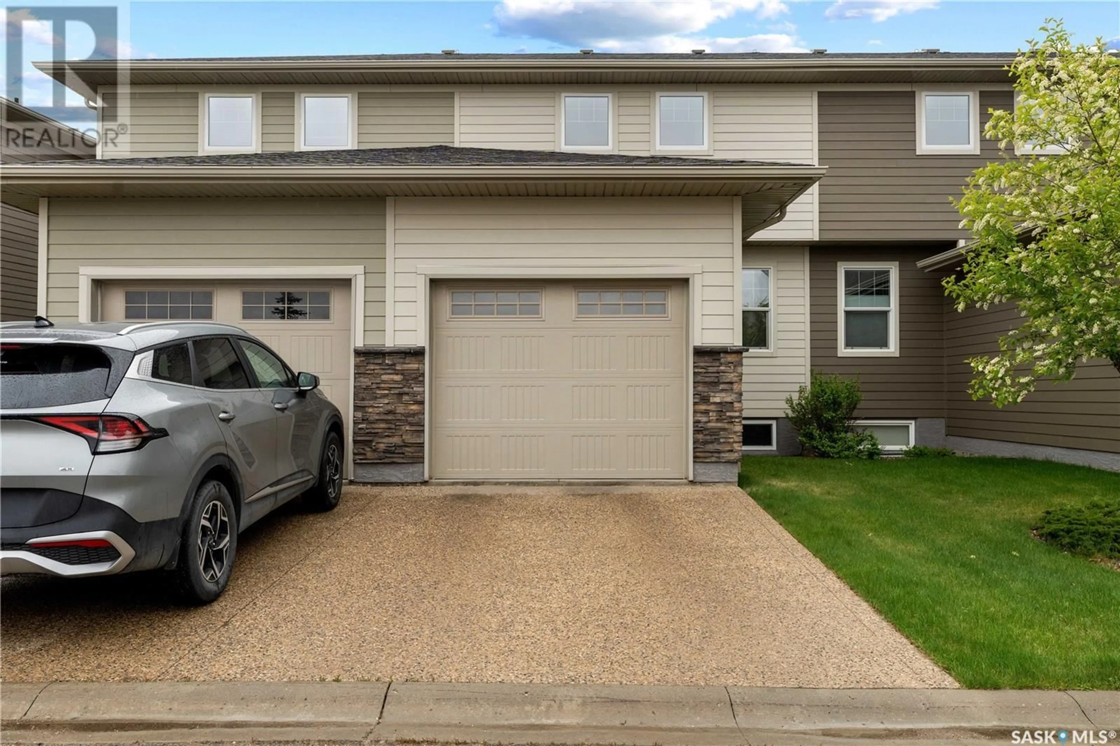 Home with vinyl exterior material, street for 4542 HARBOUR LANDING DRIVE, Regina Saskatchewan S4W0C1