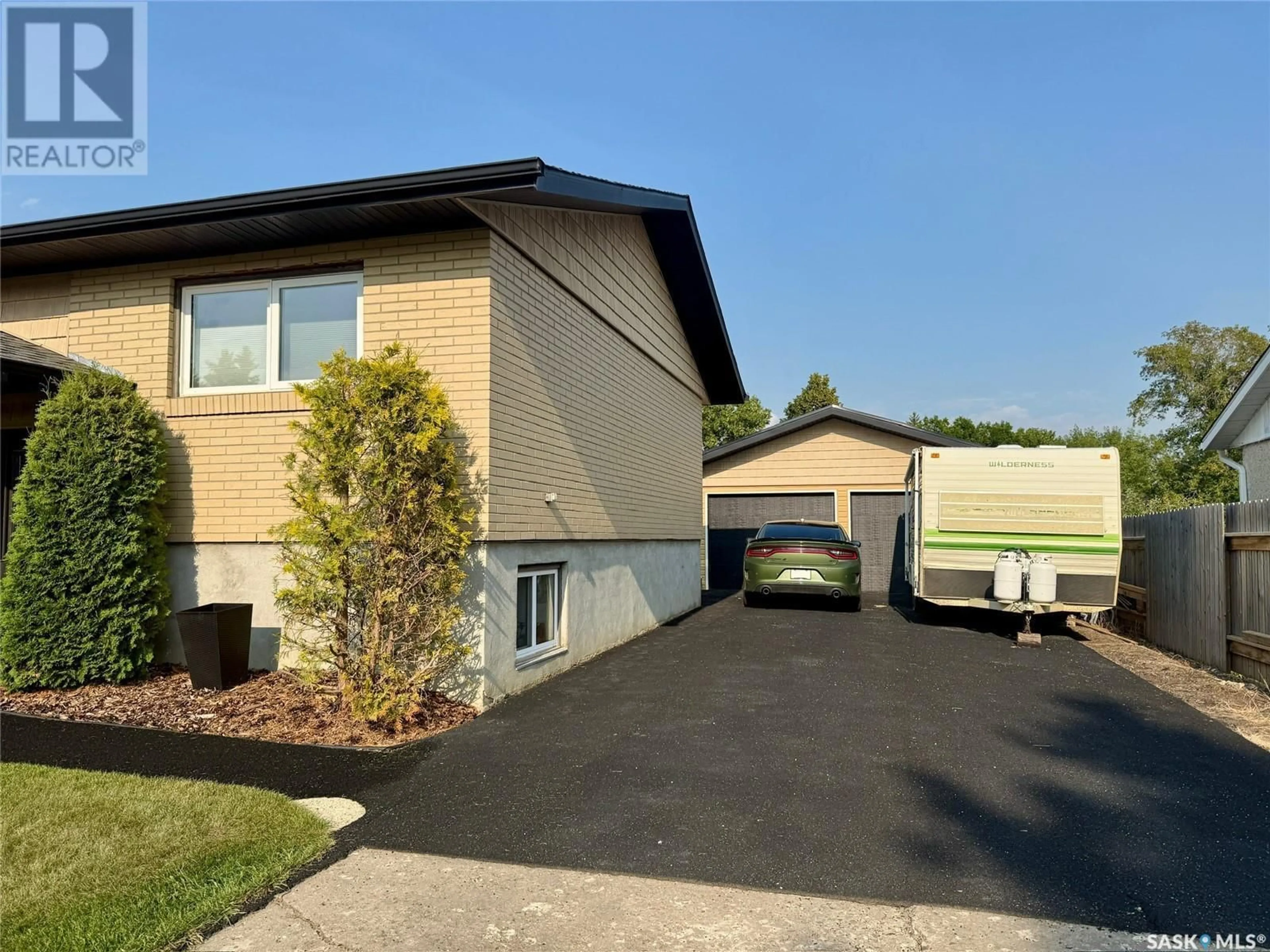 Home with vinyl exterior material, street for 1772 CENTENNIAL CRESCENT, North Battleford Saskatchewan S9A3J3