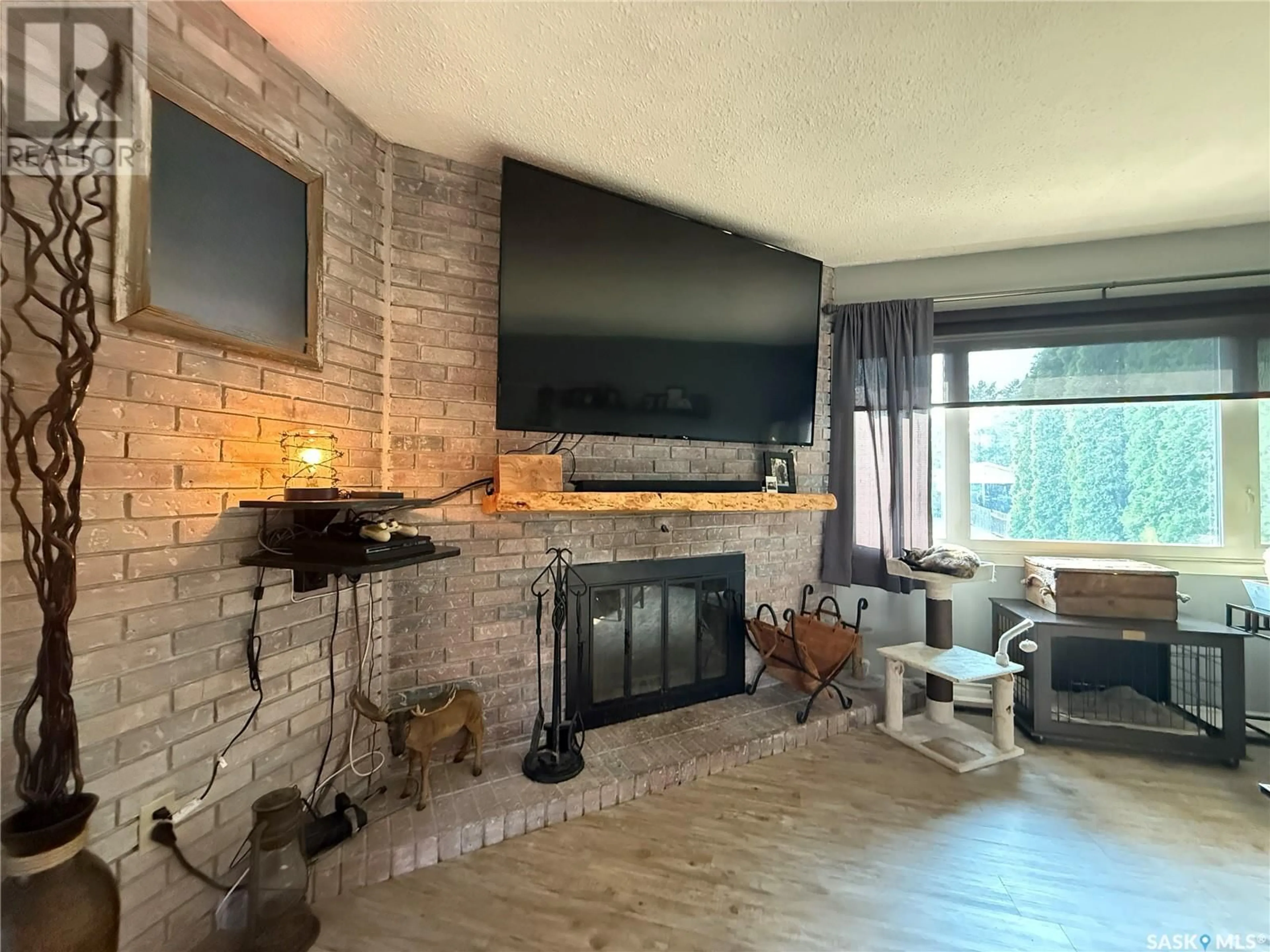 Living room with furniture, unknown for 1772 CENTENNIAL CRESCENT, North Battleford Saskatchewan S9A3J3