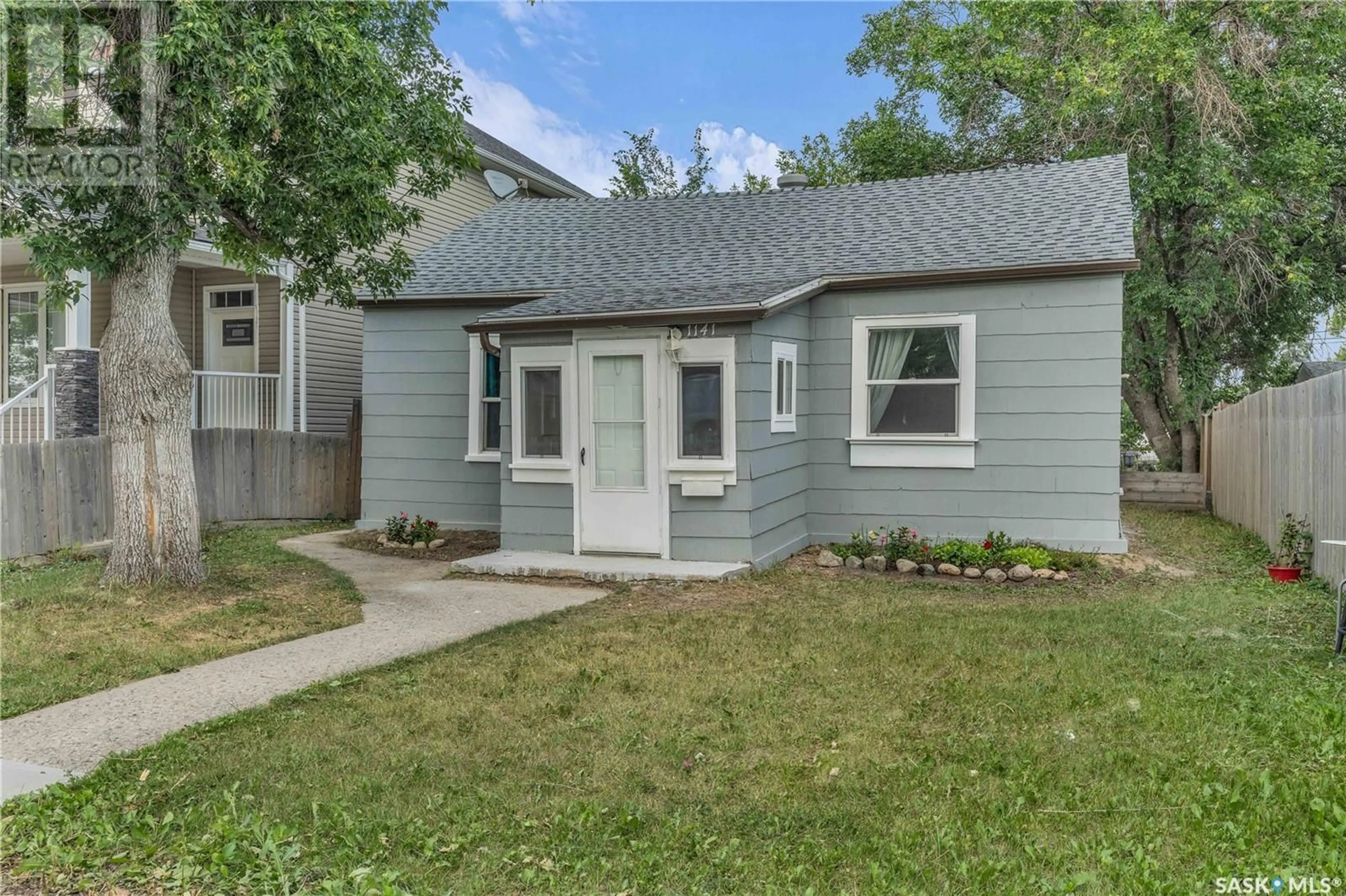 Home with vinyl exterior material, street for 1141 WALLACE STREET, Regina Saskatchewan S4N3Z1