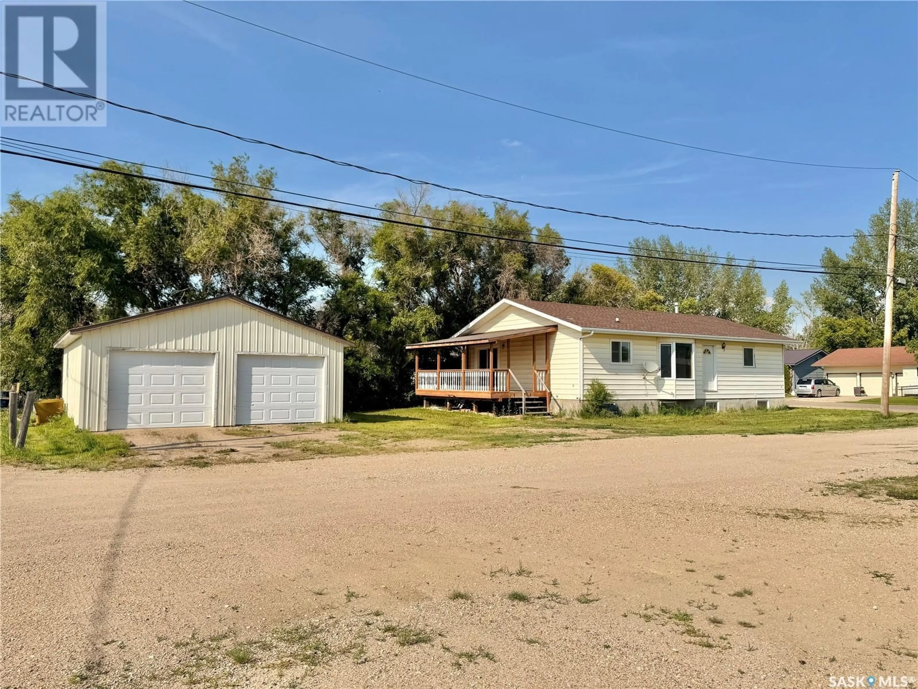 A pic from outside/outdoor area/front of a property/back of a property/a pic from drone, street for 100 1ST AVENUE, Lucky Lake Saskatchewan S0L1Z0