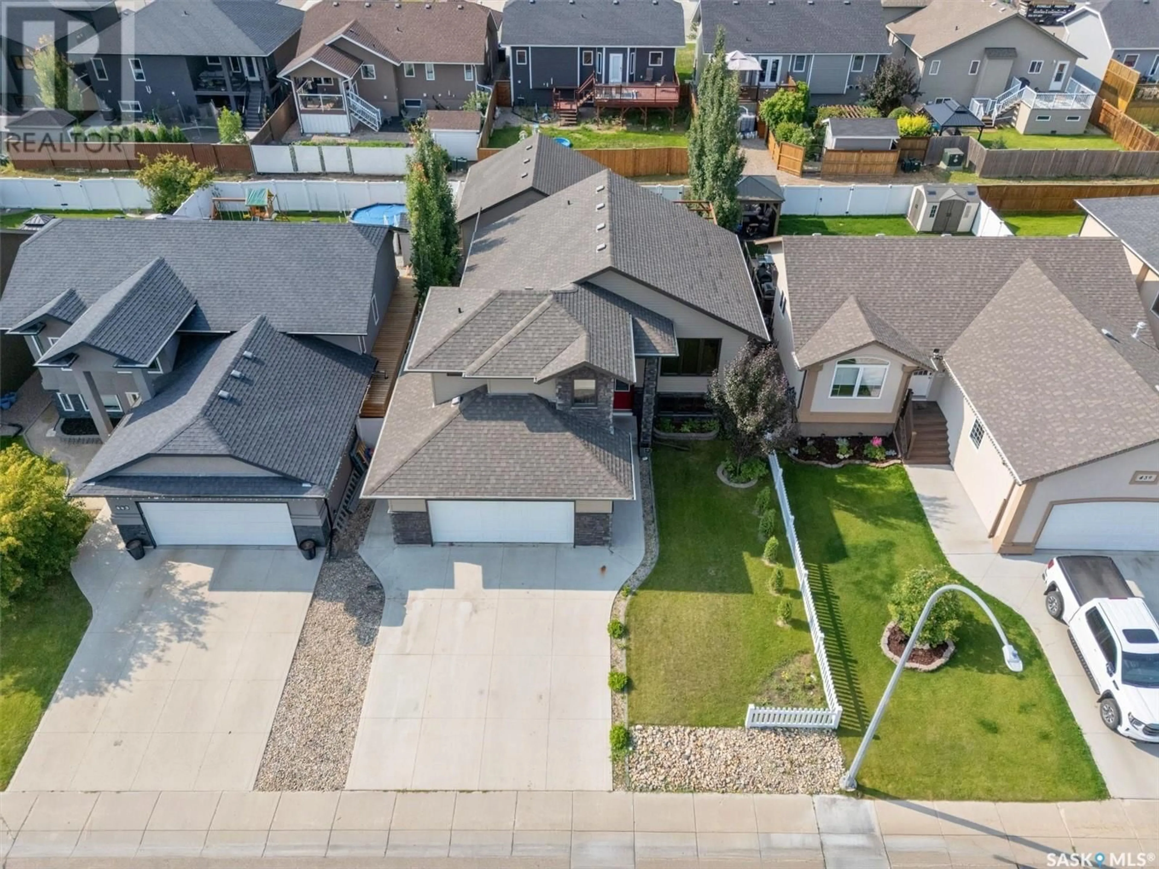 A pic from outside/outdoor area/front of a property/back of a property/a pic from drone, street for 441 SNEAD CRESCENT, Warman Saskatchewan S0K4S1