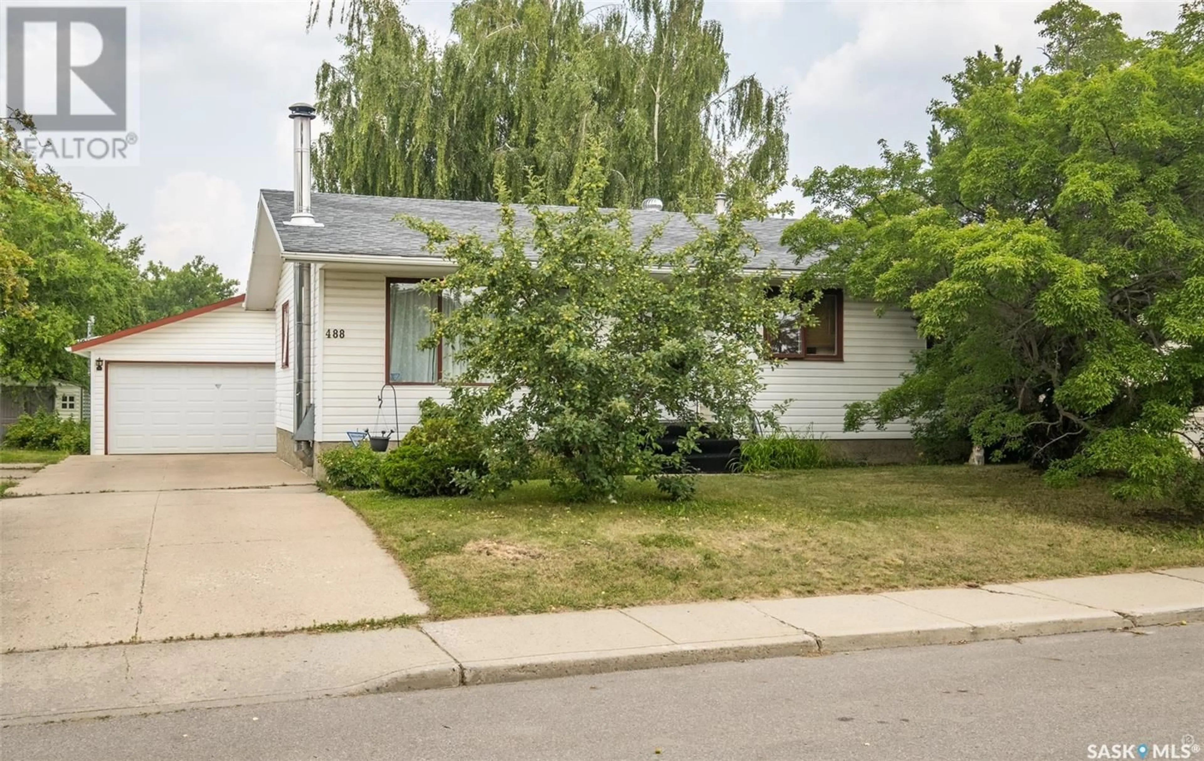 Home with vinyl exterior material, street for 488 BENNETT DRIVE, Prince Albert Saskatchewan S6V6H6