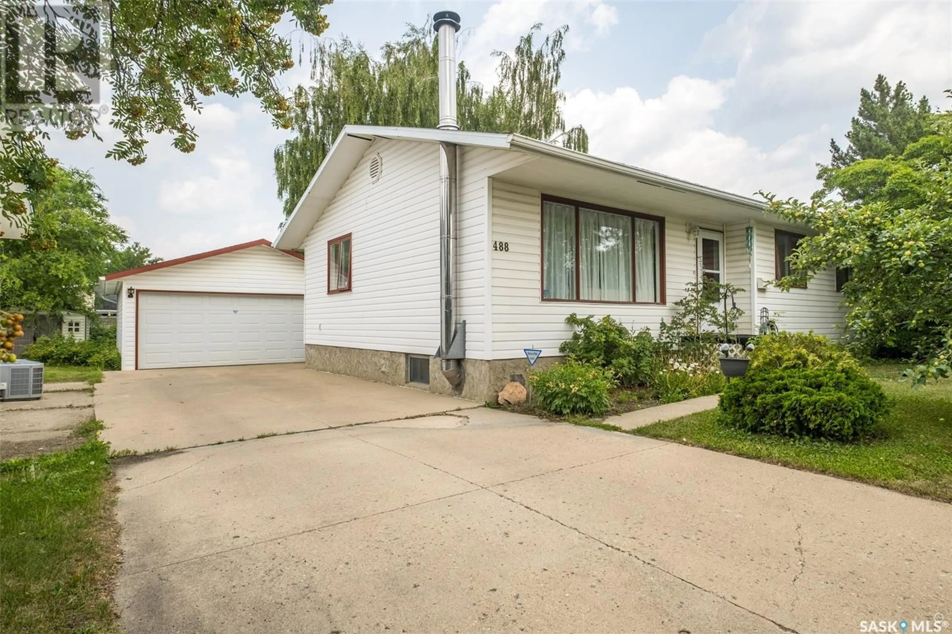 Home with vinyl exterior material, street for 488 BENNETT DRIVE, Prince Albert Saskatchewan S6V6H6