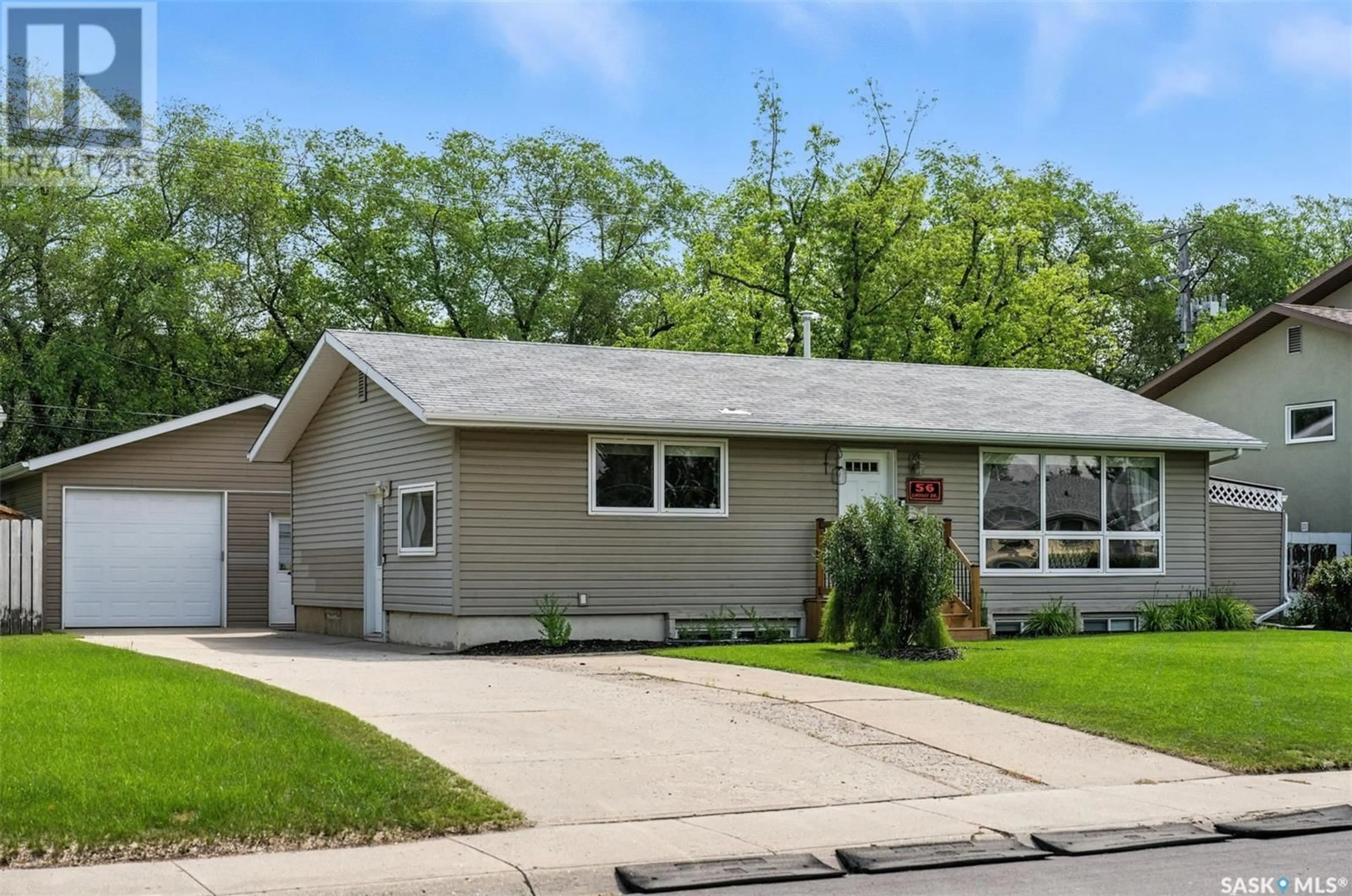 Home with vinyl exterior material, street for 56 LINDSAY DRIVE, Saskatoon Saskatchewan S7H3E1