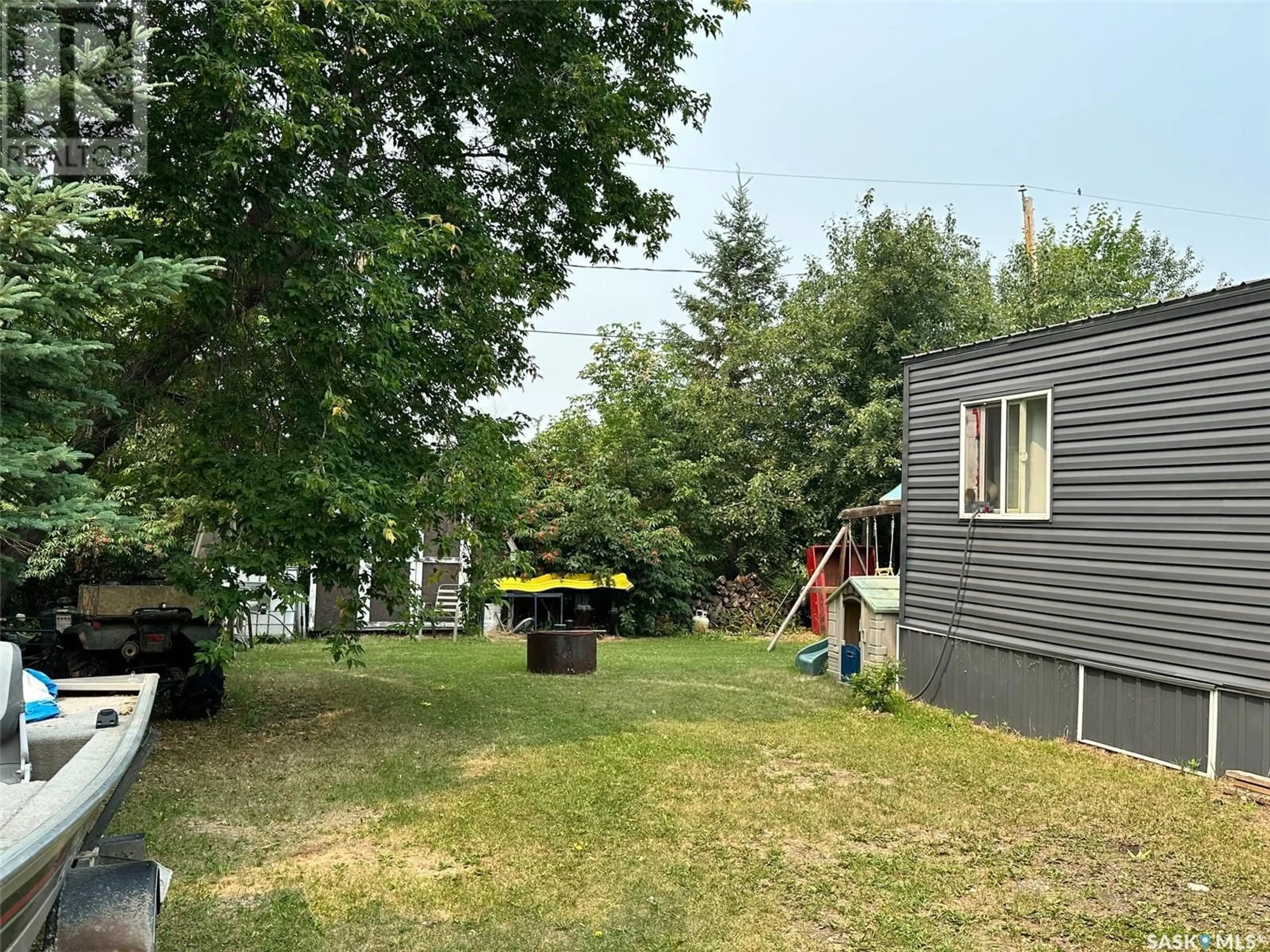 A pic from outside/outdoor area/front of a property/back of a property/a pic from drone, unknown for 16 MAIN STREET, Hudson Bay Saskatchewan S0E0Y0
