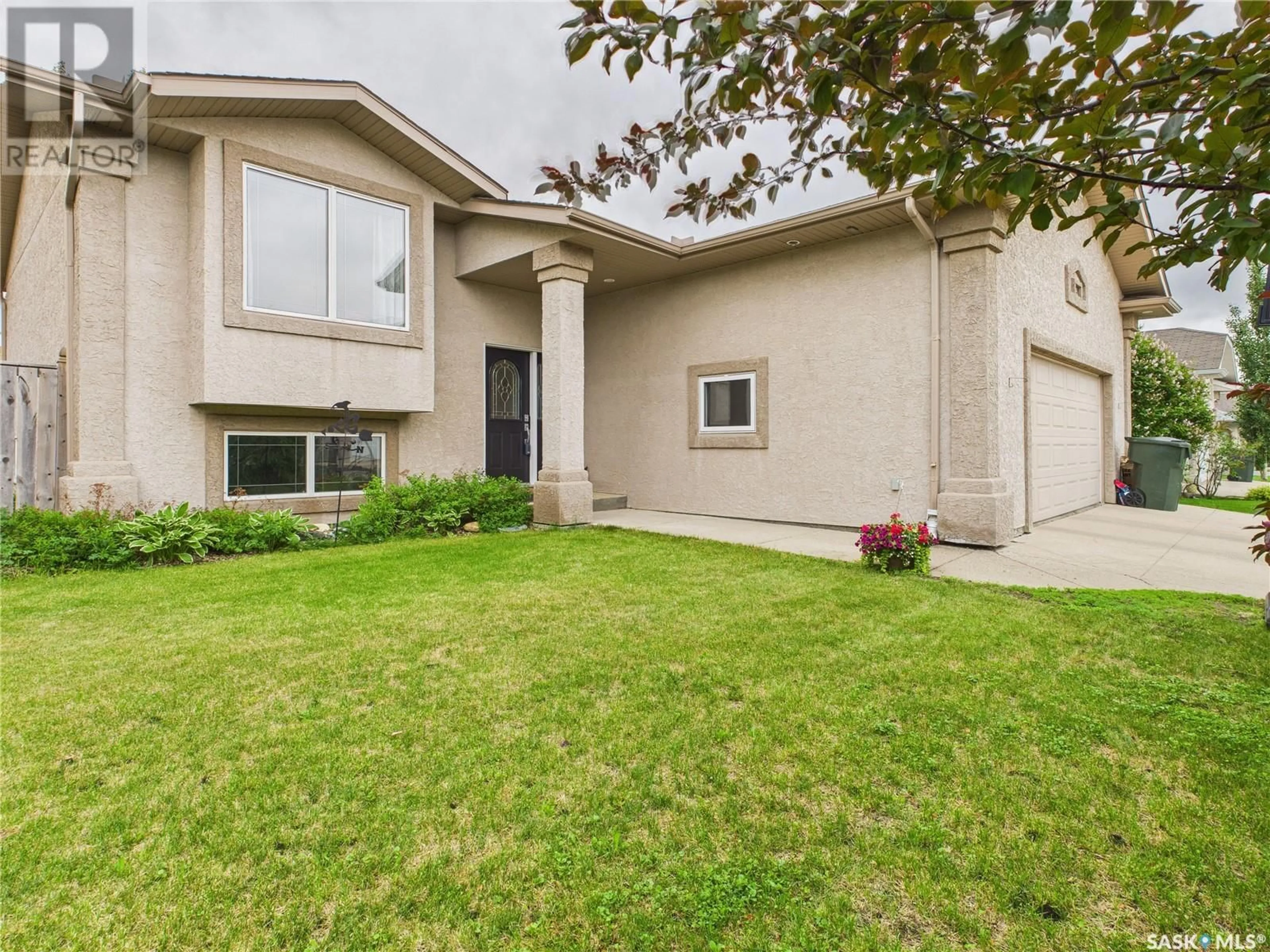 Home with vinyl exterior material, street for 615 CASEY ROAD, Prince Albert Saskatchewan S6V8C9