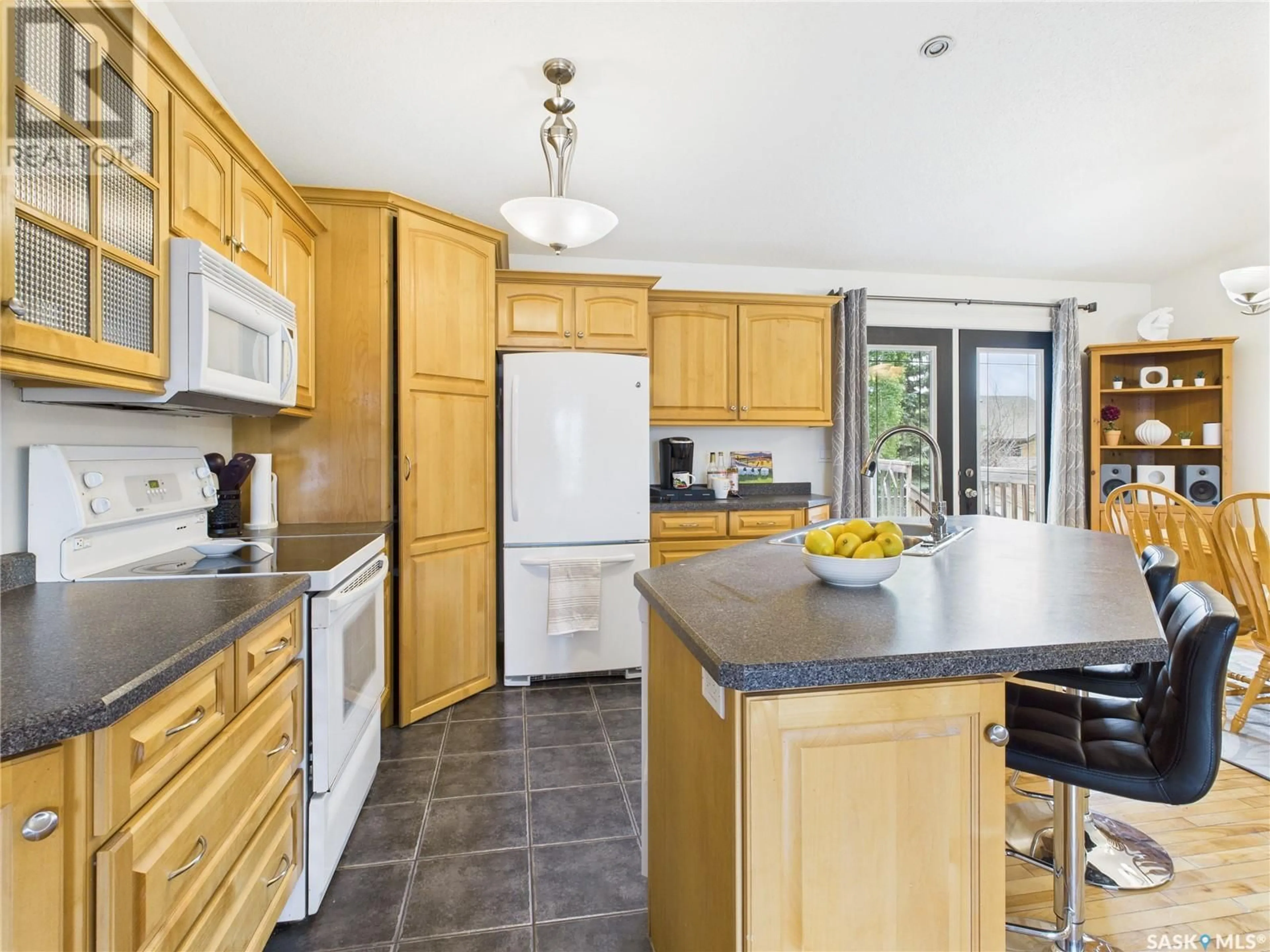 Open concept kitchen, ceramic/tile floor for 615 CASEY ROAD, Prince Albert Saskatchewan S6V8C9