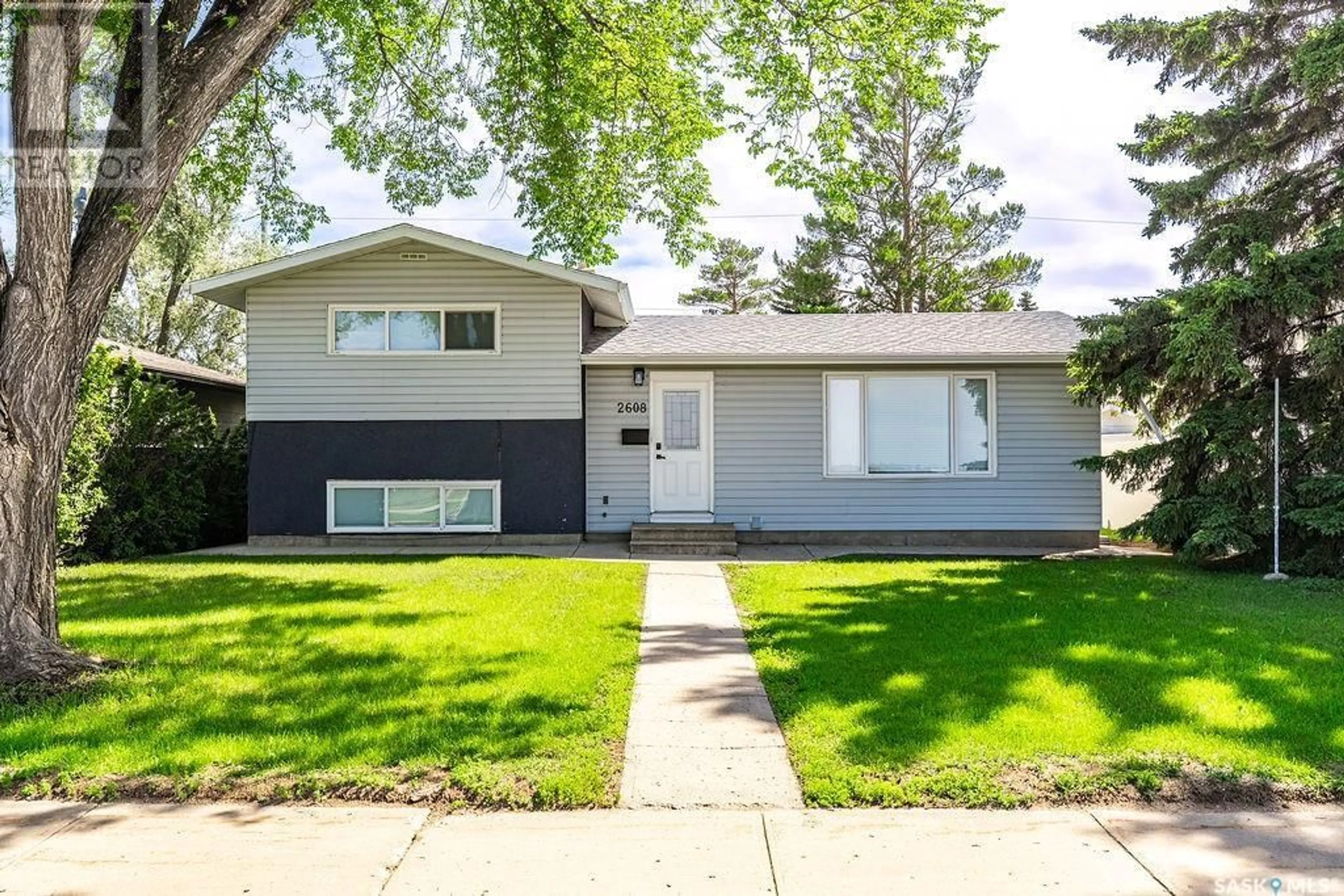 Home with vinyl exterior material, street for 2608 14TH STREET, Saskatoon Saskatchewan S7H0B3