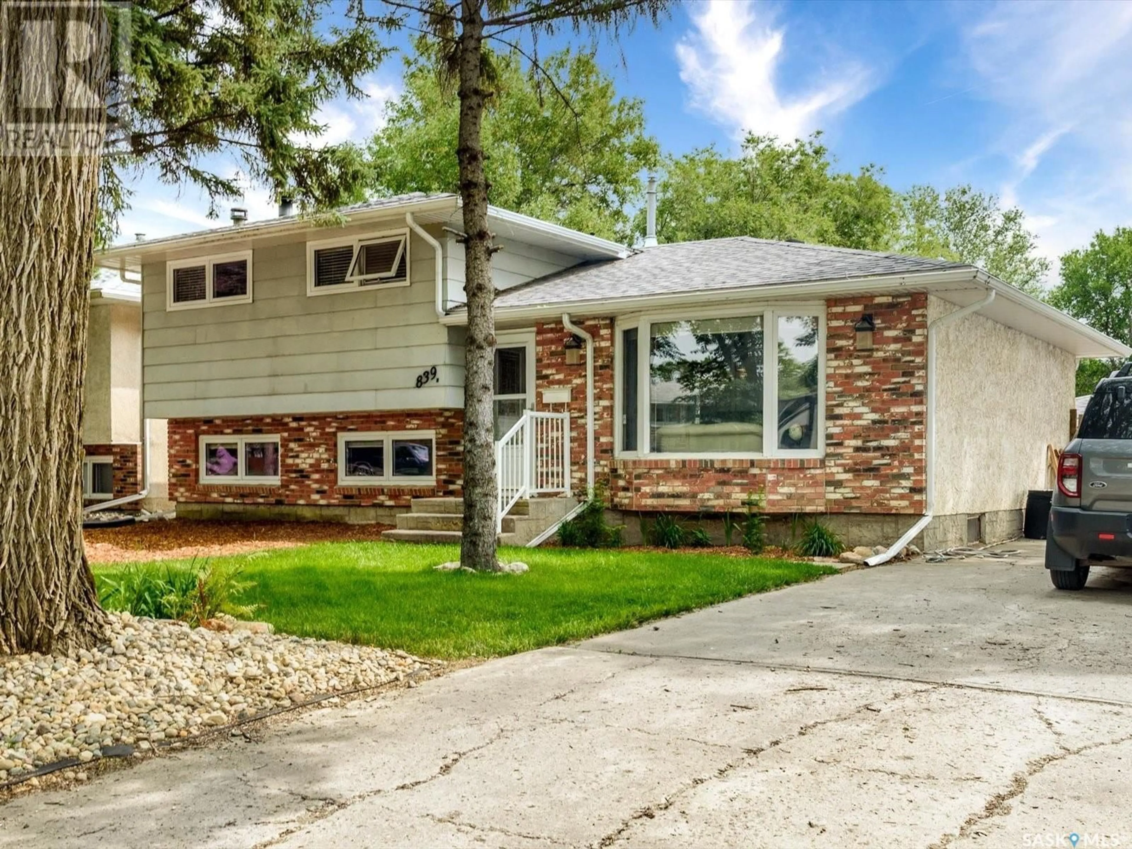 Home with brick exterior material, street for 839 MCINTOSH STREET, Regina Saskatchewan S4R6H1