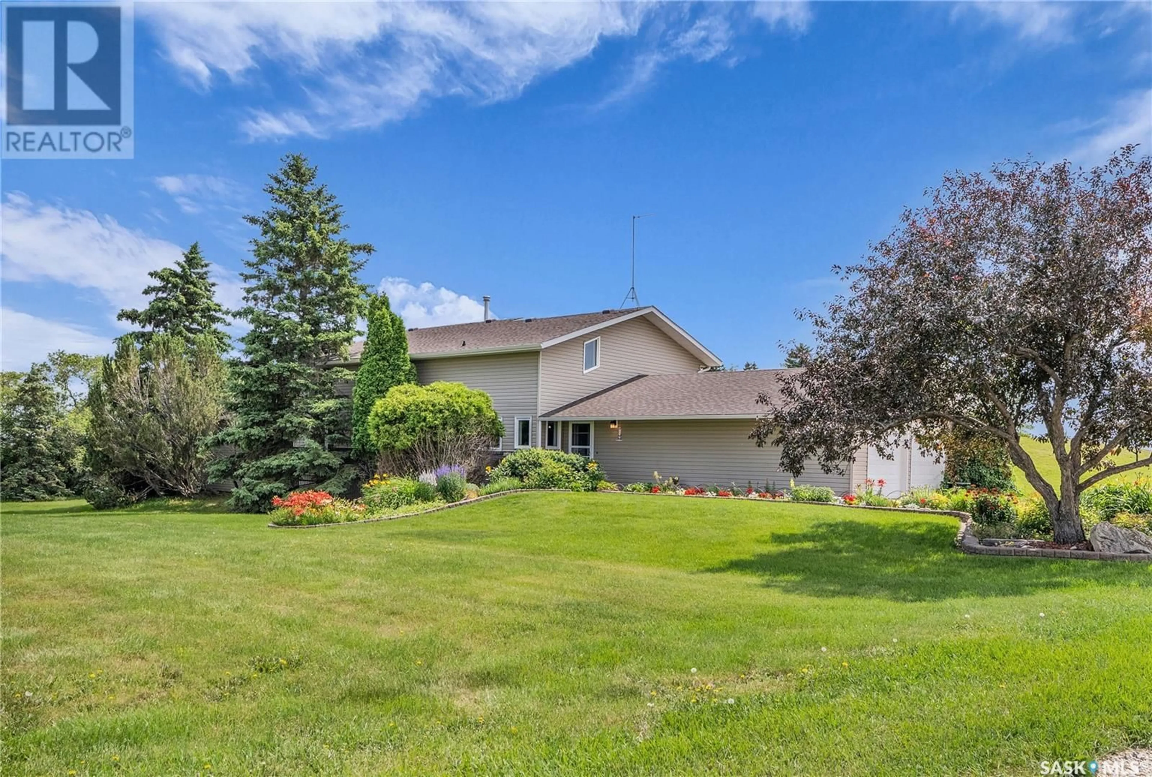 A pic from outside/outdoor area/front of a property/back of a property/a pic from drone, unknown for SAPSFORD ACREAGE, Perdue Rm No. 346 Saskatchewan S0K3C0