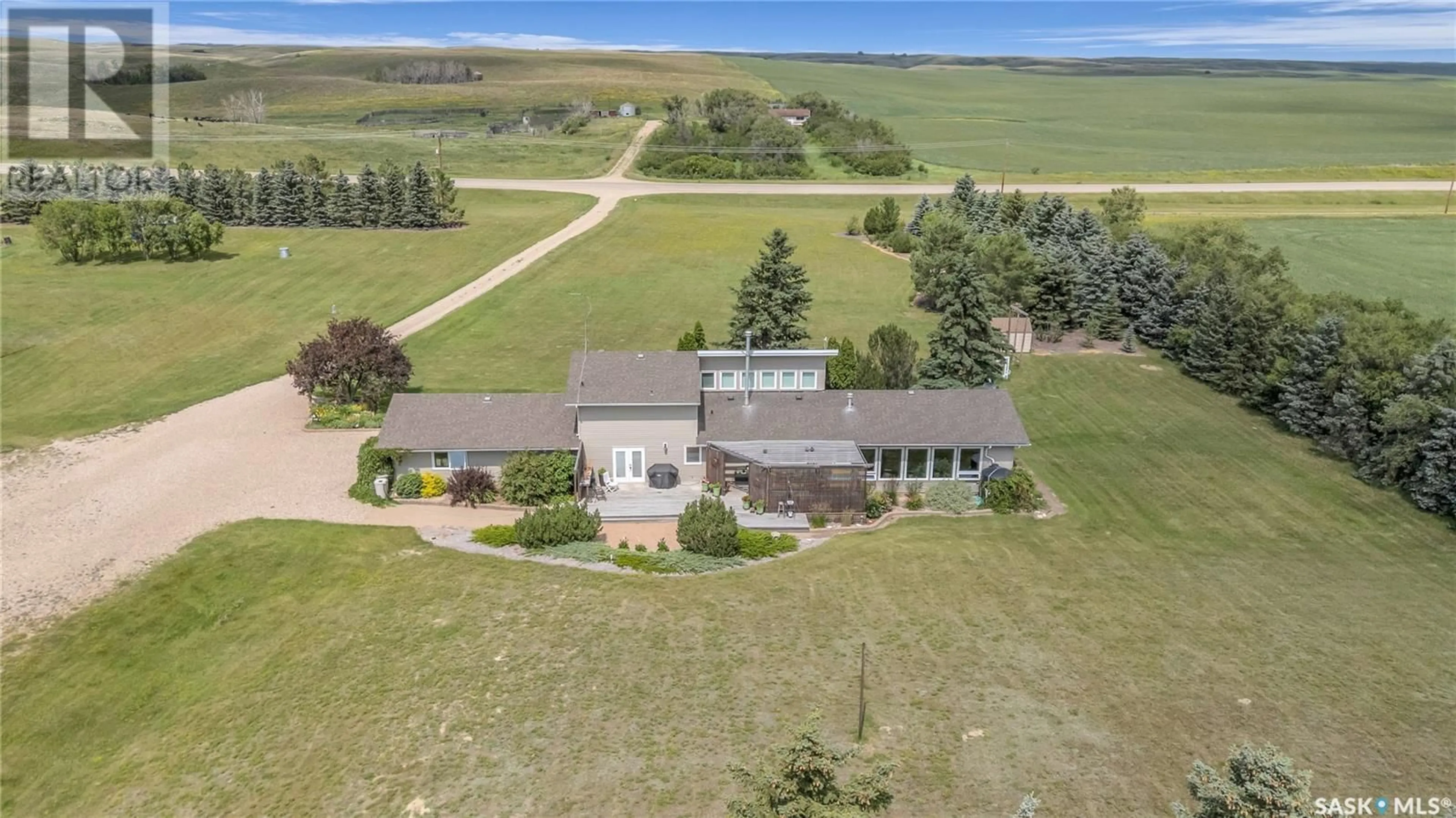 A pic from outside/outdoor area/front of a property/back of a property/a pic from drone, unknown for SAPSFORD ACREAGE, Perdue Rm No. 346 Saskatchewan S0K3C0