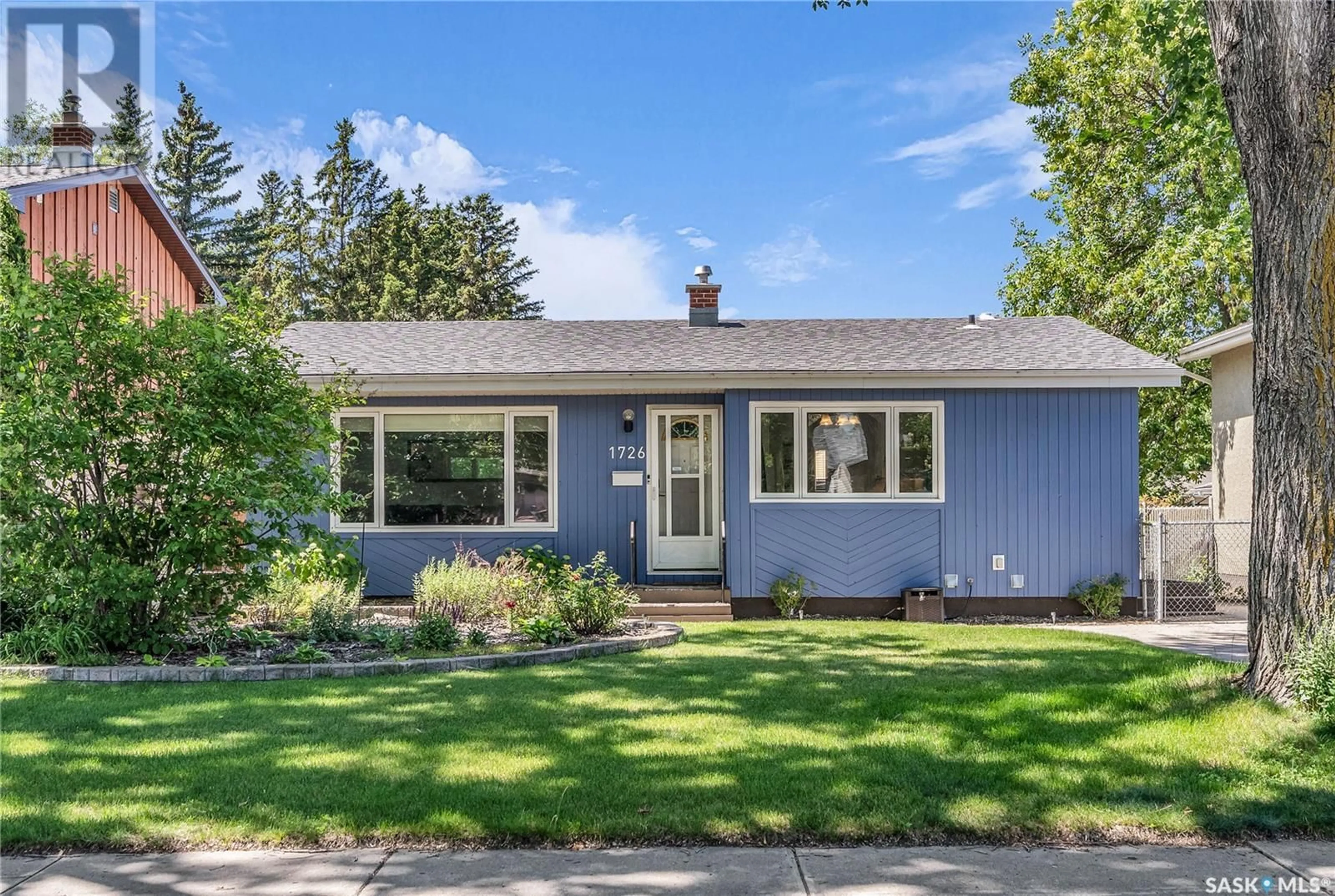 Home with vinyl exterior material, street for 1726 CAMERON AVENUE, Saskatoon Saskatchewan S7H3N3