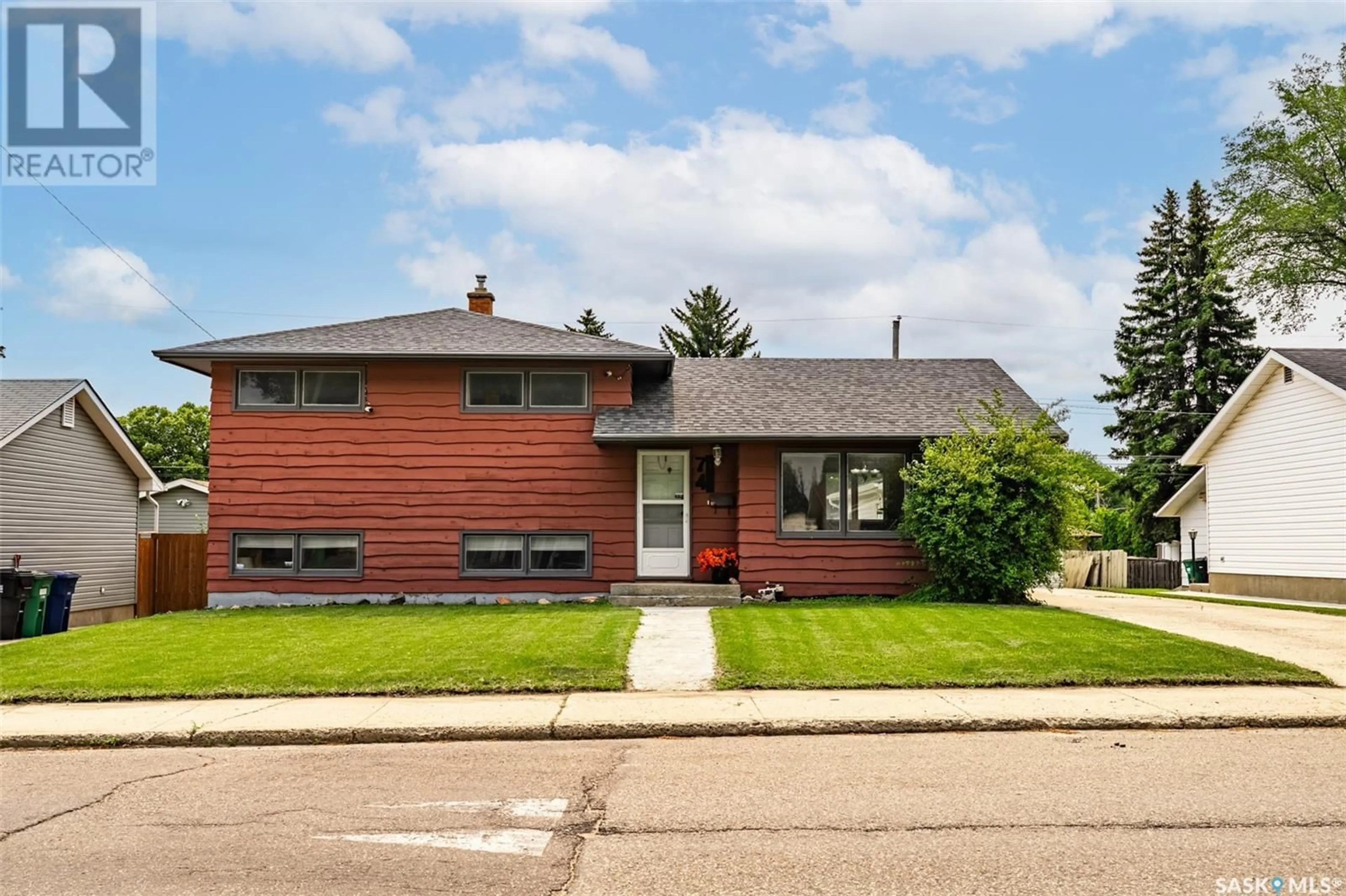 Home with brick exterior material, street for 74 HOWELL AVENUE, Saskatoon Saskatchewan S7L3T2