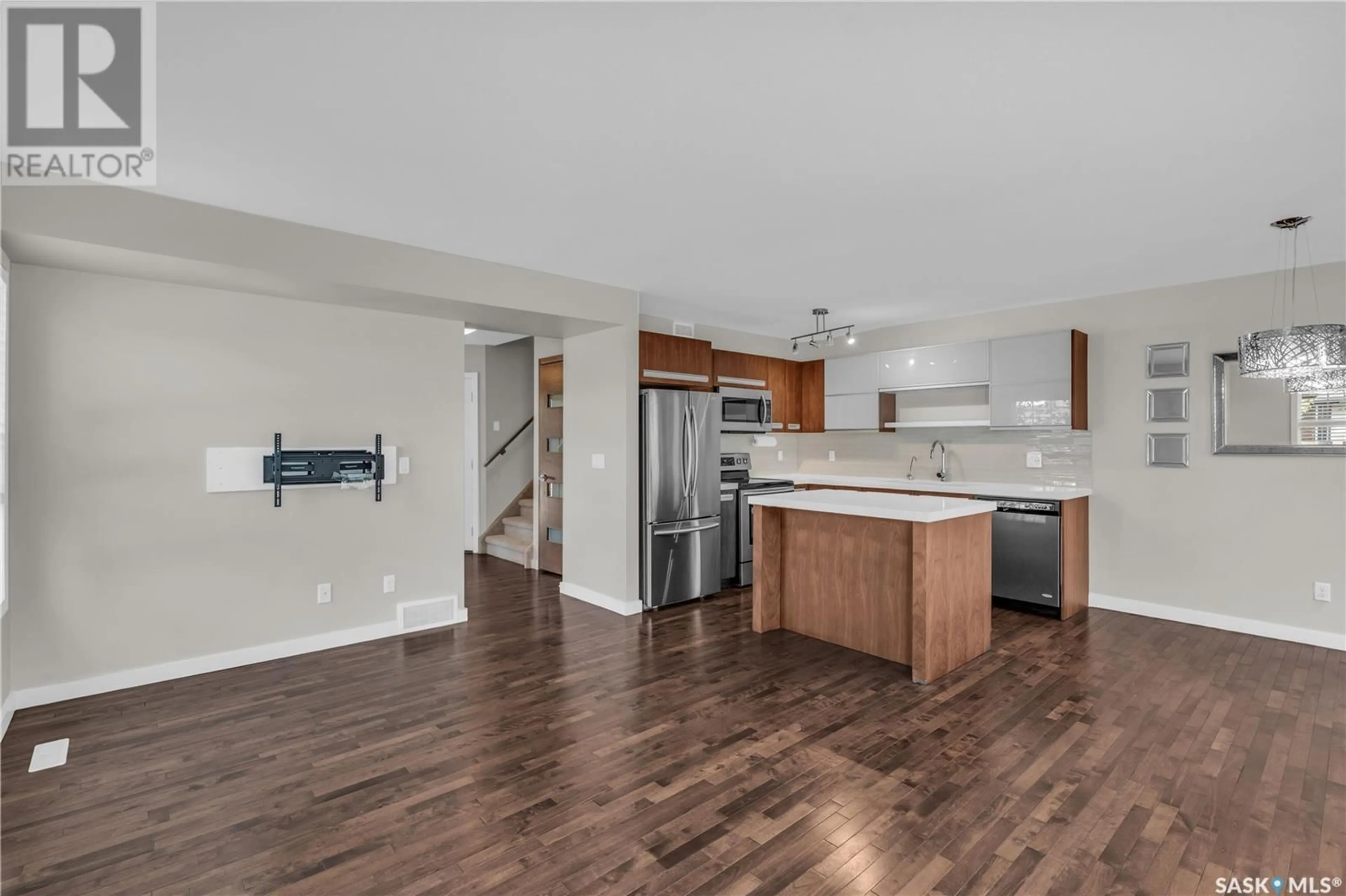 Open concept kitchen, wood/laminate floor for 424 1303 PATON CRESCENT, Saskatoon Saskatchewan S7W0P6