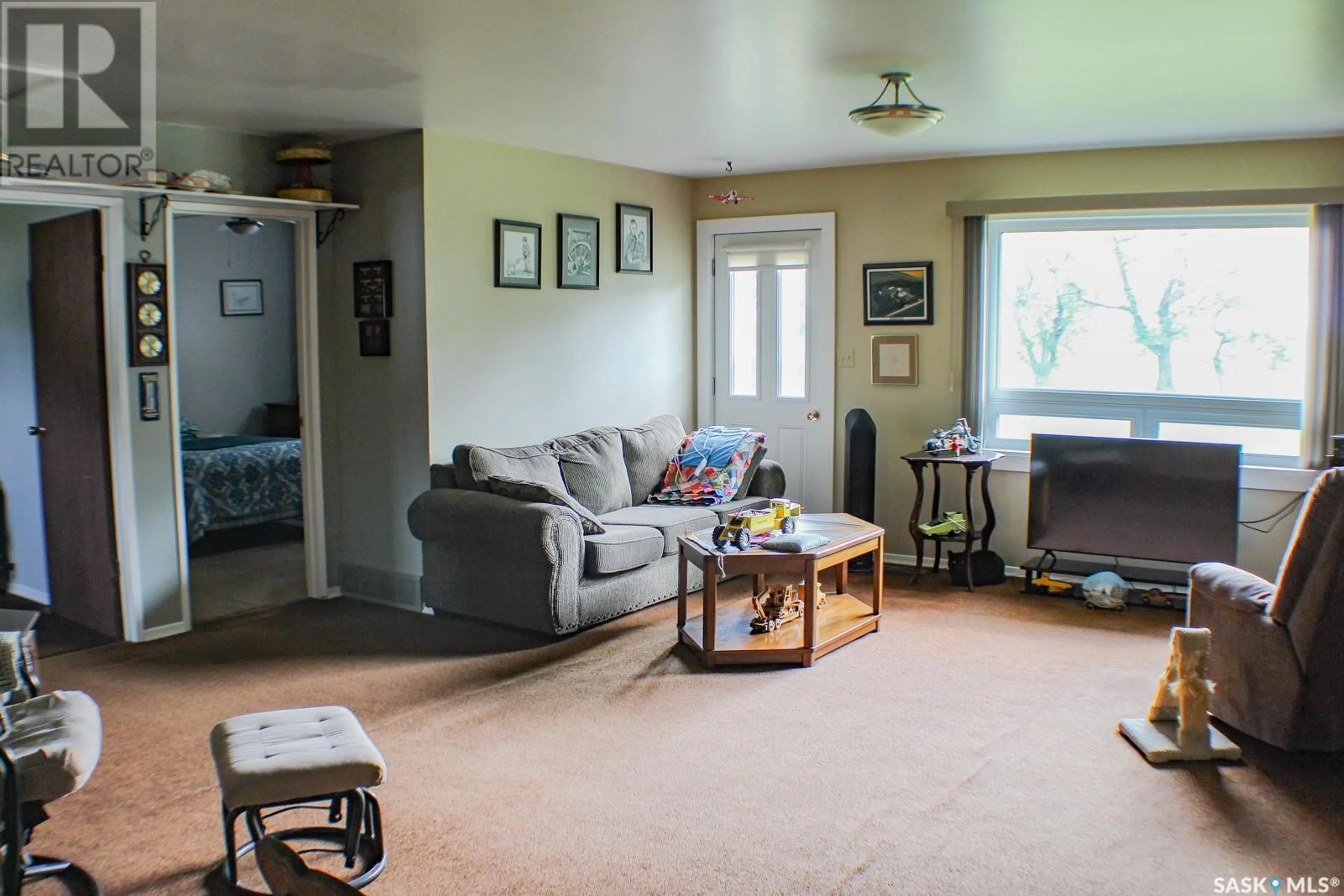 Living room with furniture, unknown for HARMON ACREAGE, Fletts Springs Rm No. 429 Saskatchewan S0K3V0