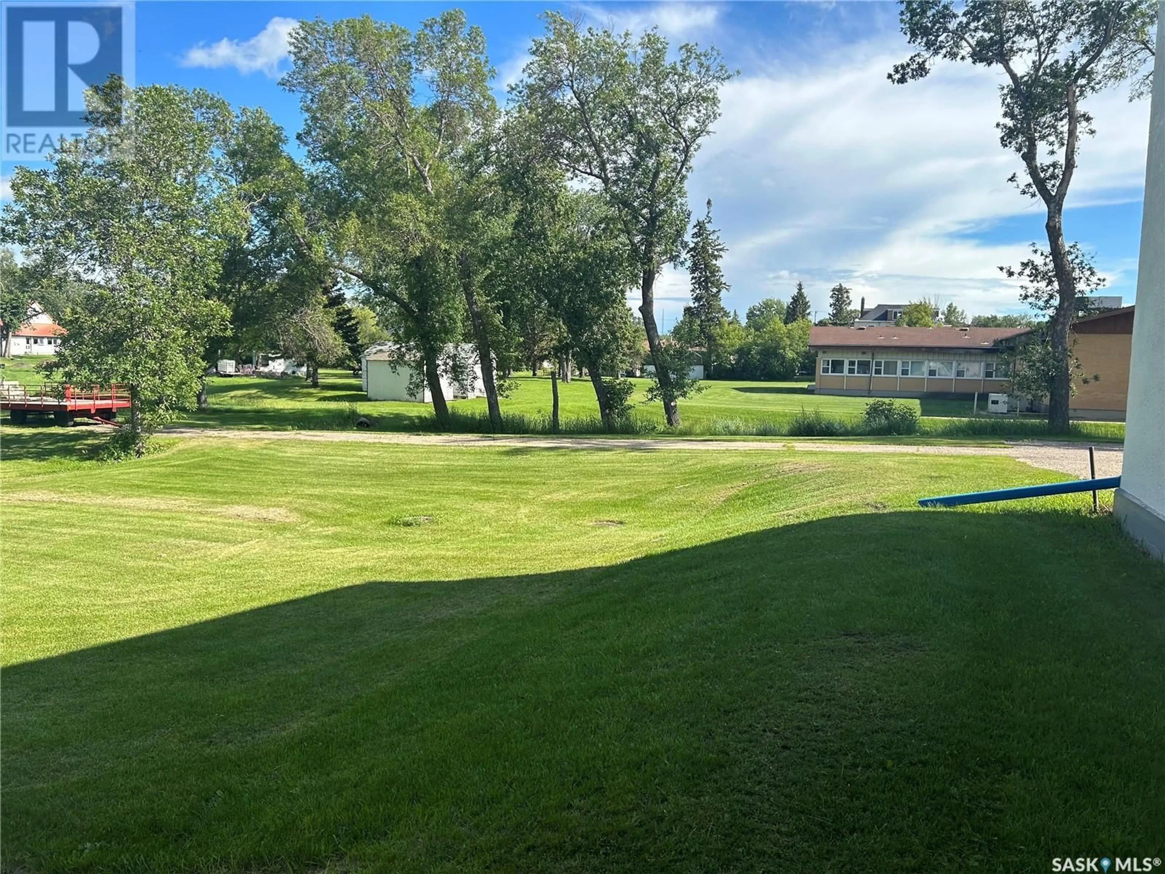 A pic from outside/outdoor area/front of a property/back of a property/a pic from drone, unknown for 713 STELLA STREET, Grenfell Saskatchewan S0G2B0