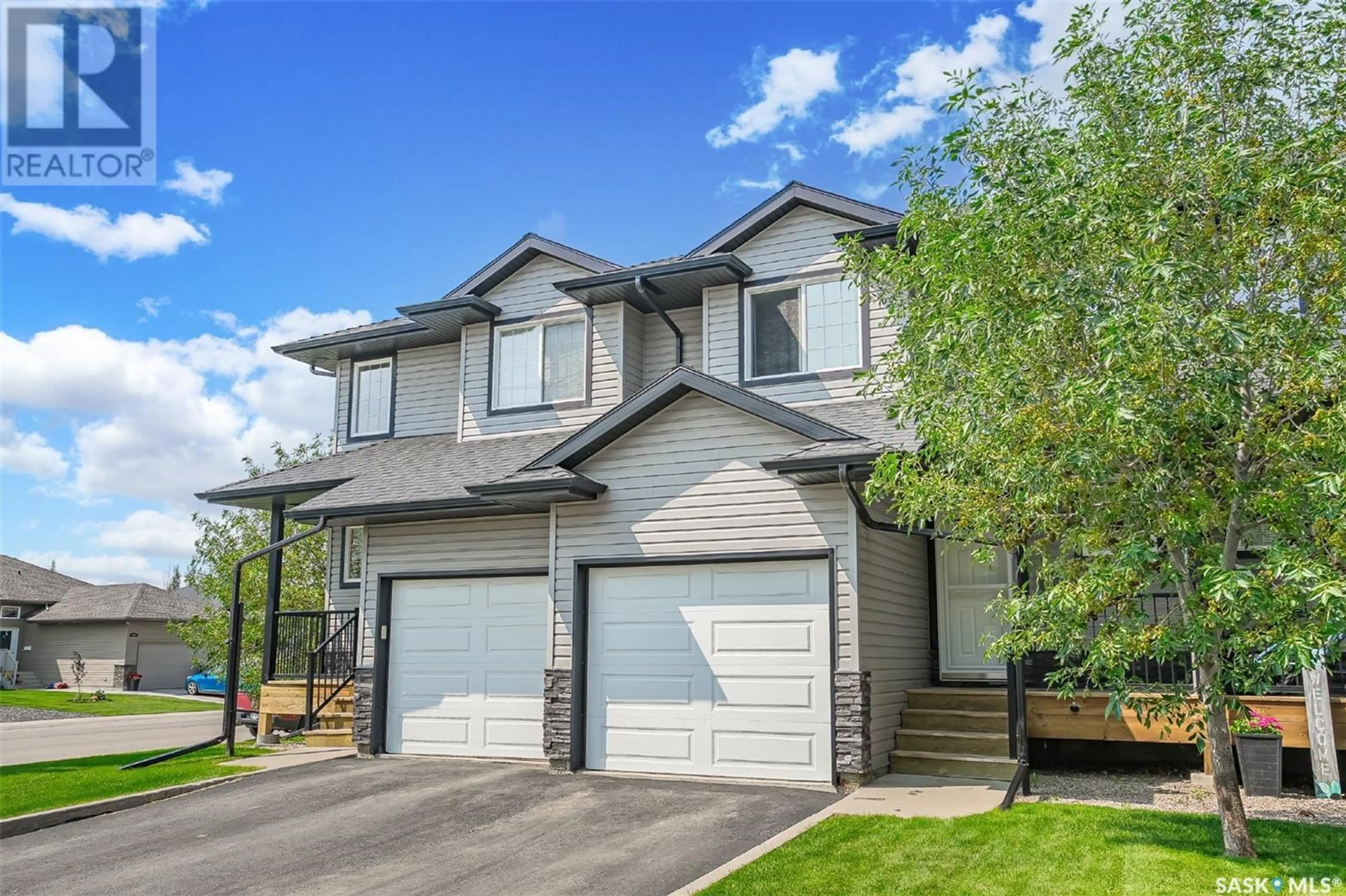 Home with vinyl exterior material, street for 901 - 115 4TH STREET, Martensville Saskatchewan S0K0A2