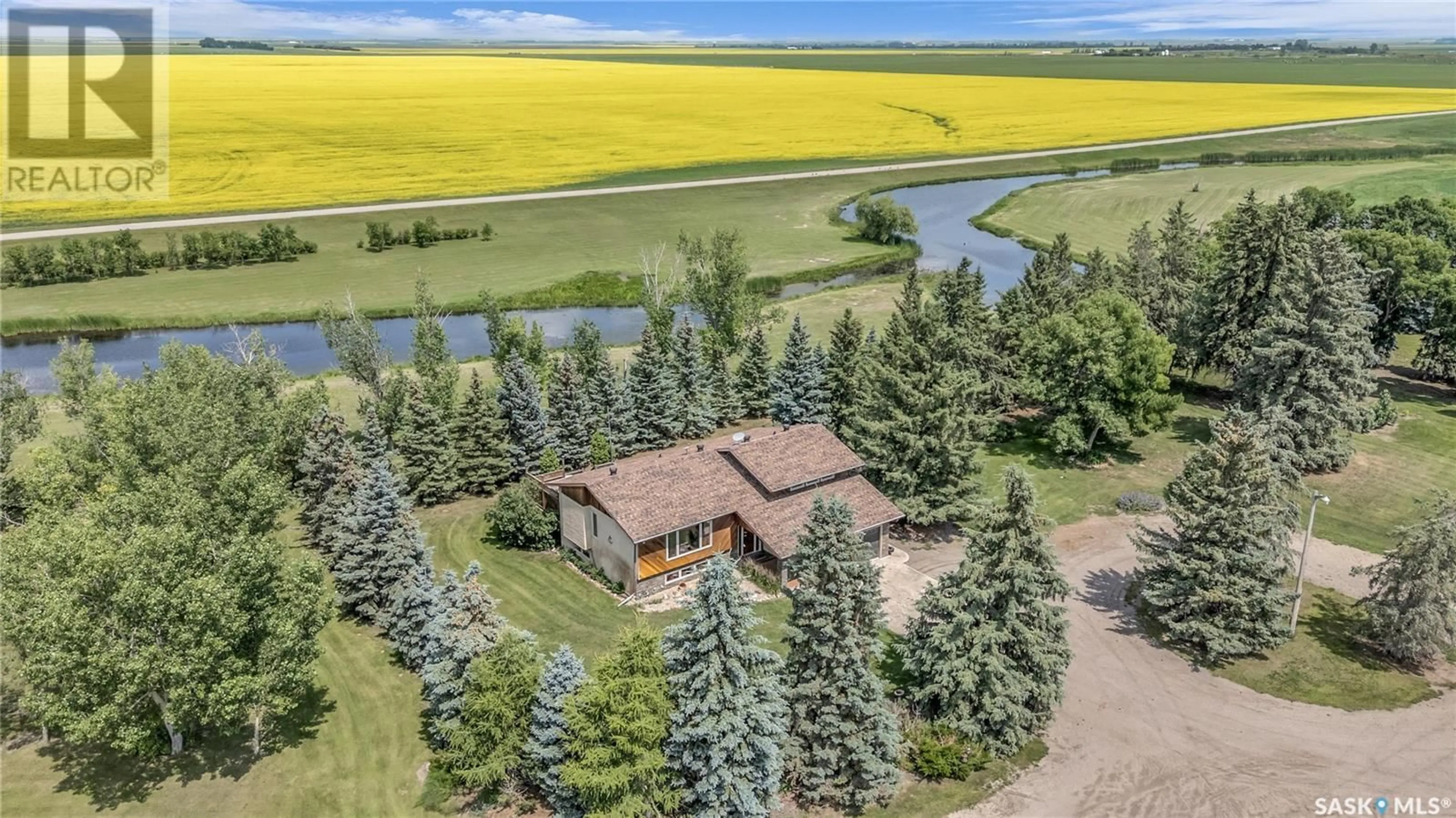 A pic from outside/outdoor area/front of a property/back of a property/a pic from drone, water/lake/river/ocean view for MORLEY ACREAGE, Francis Rm No. 127 Saskatchewan S0G1V0