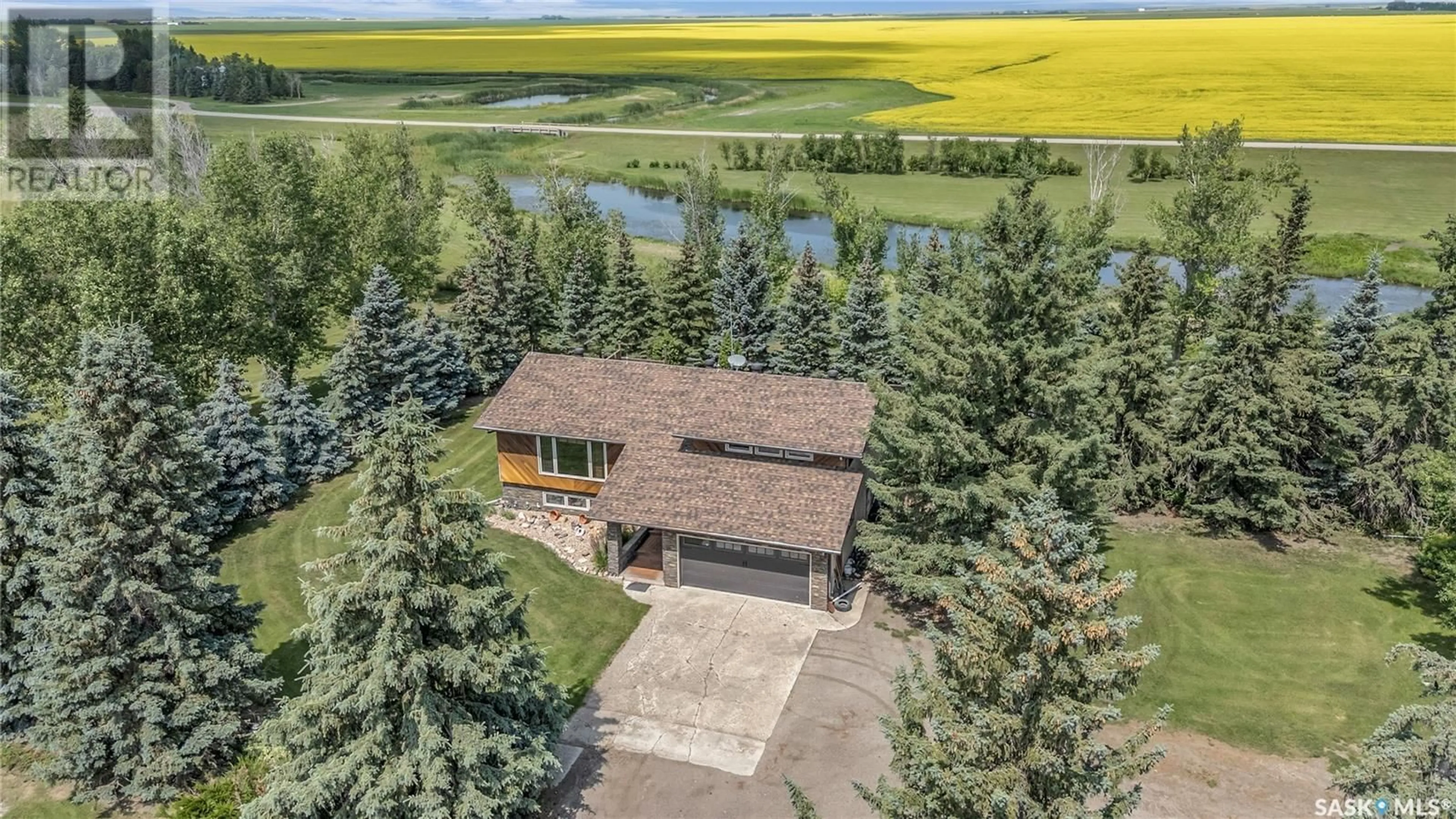 A pic from outside/outdoor area/front of a property/back of a property/a pic from drone, water/lake/river/ocean view for MORLEY ACREAGE, Francis Rm No. 127 Saskatchewan S0G1V0