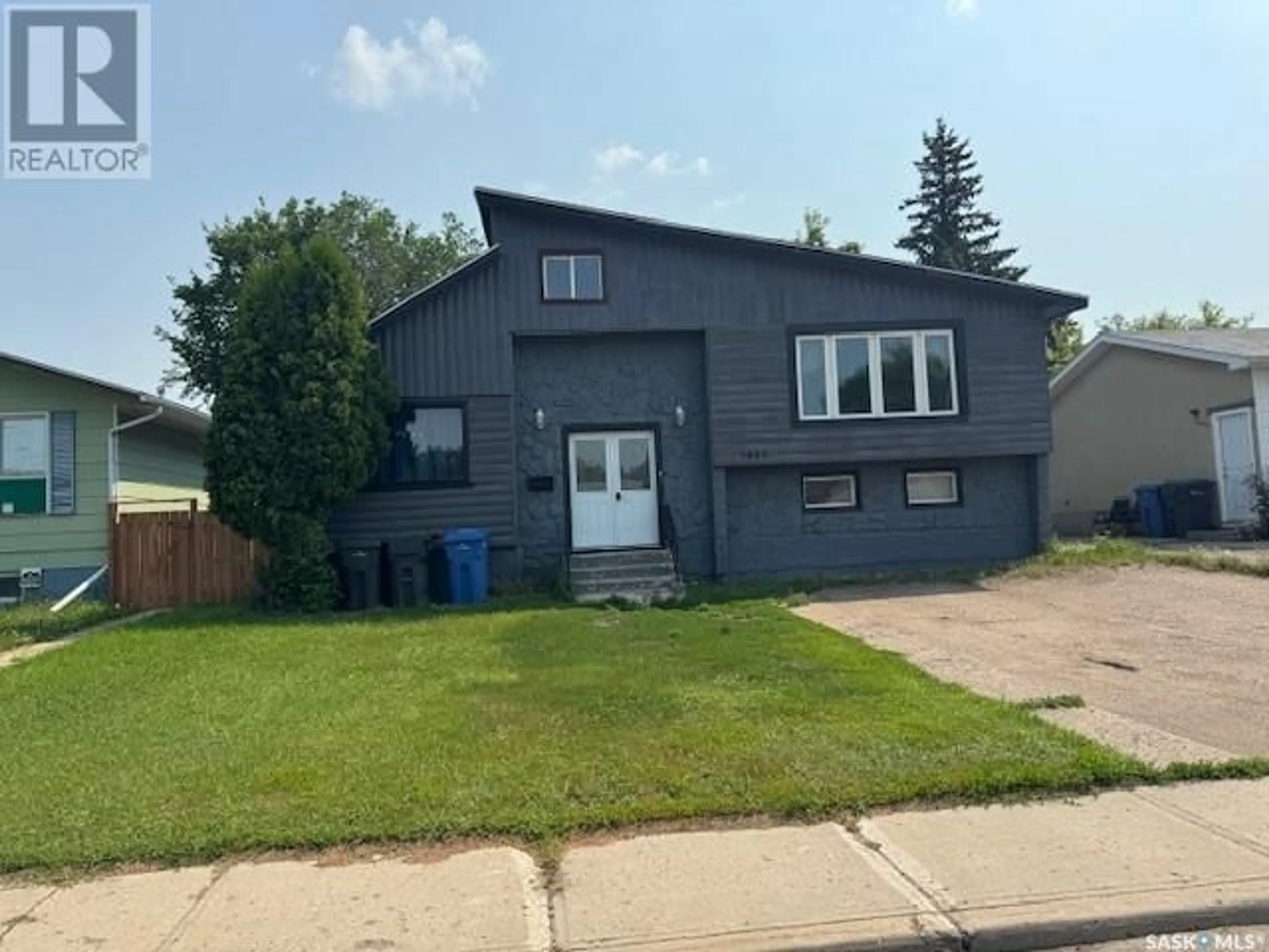 Home with vinyl exterior material, street for 1482 110TH STREET, North Battleford Saskatchewan S9A2J2