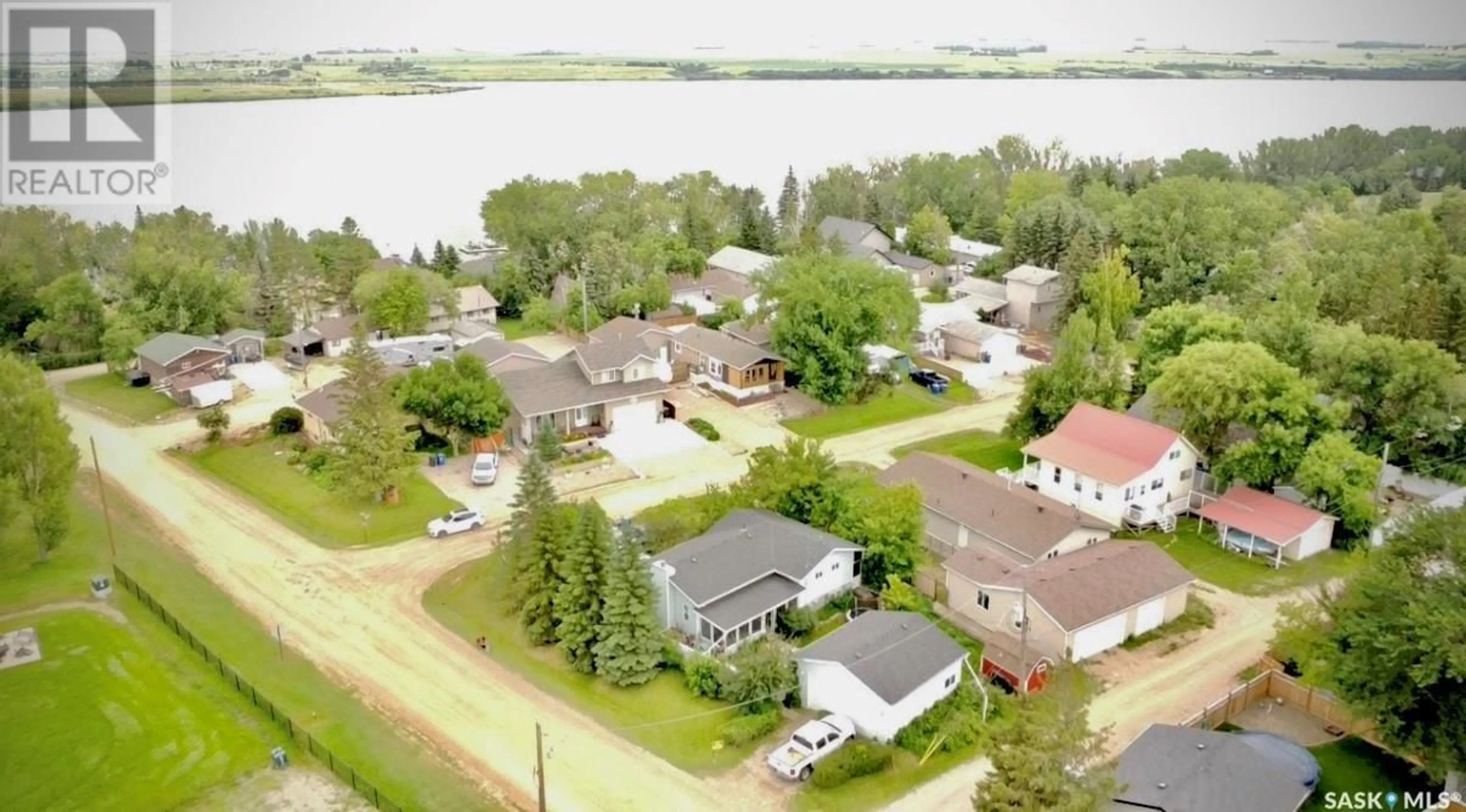 A pic from outside/outdoor area/front of a property/back of a property/a pic from drone, water/lake/river/ocean view for 2 HORDERN STREET, Shields Saskatchewan S7C0A1