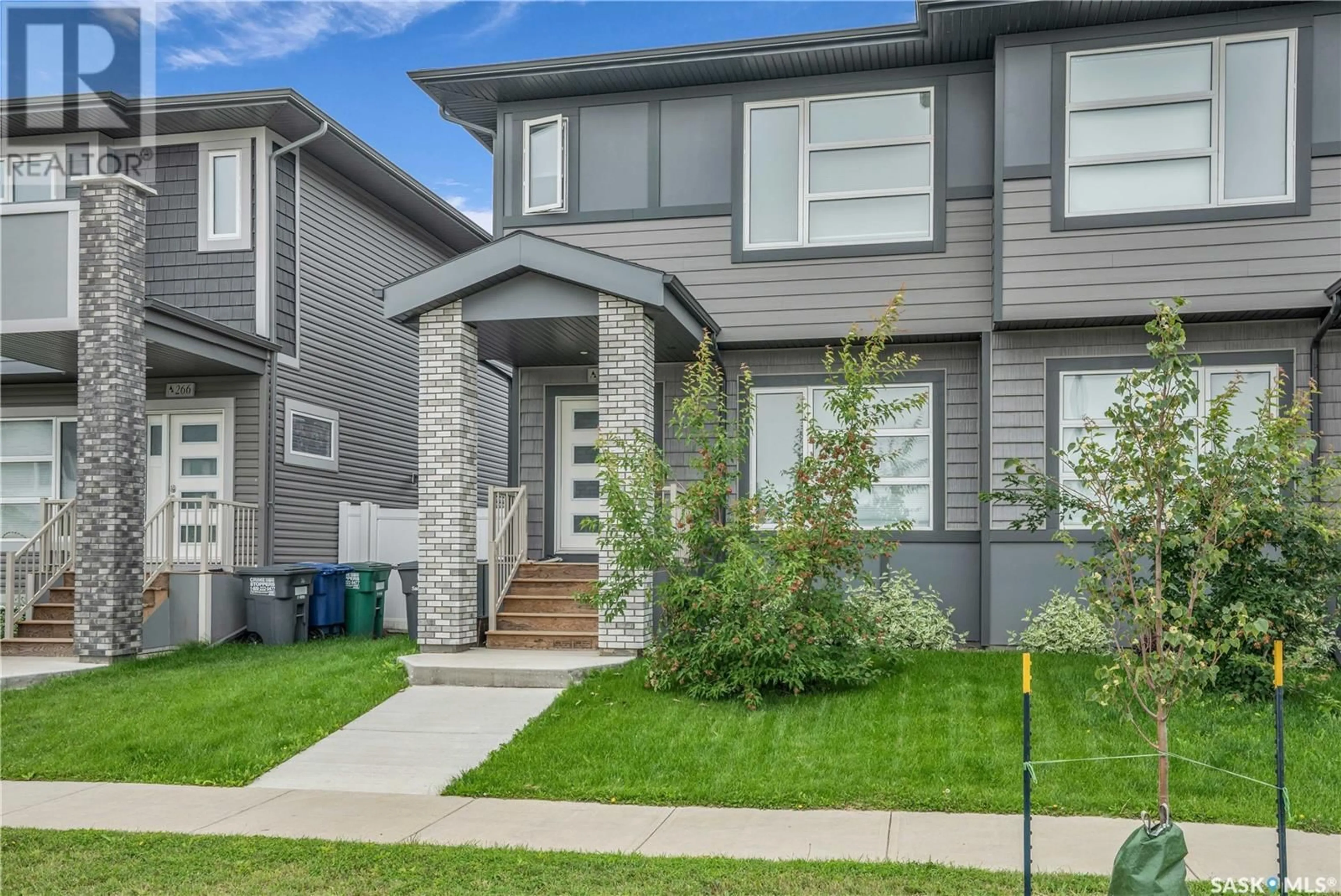 Home with vinyl exterior material, street for 262 BRIGHTON BOULEVARD, Saskatoon Saskatchewan S7V0V8
