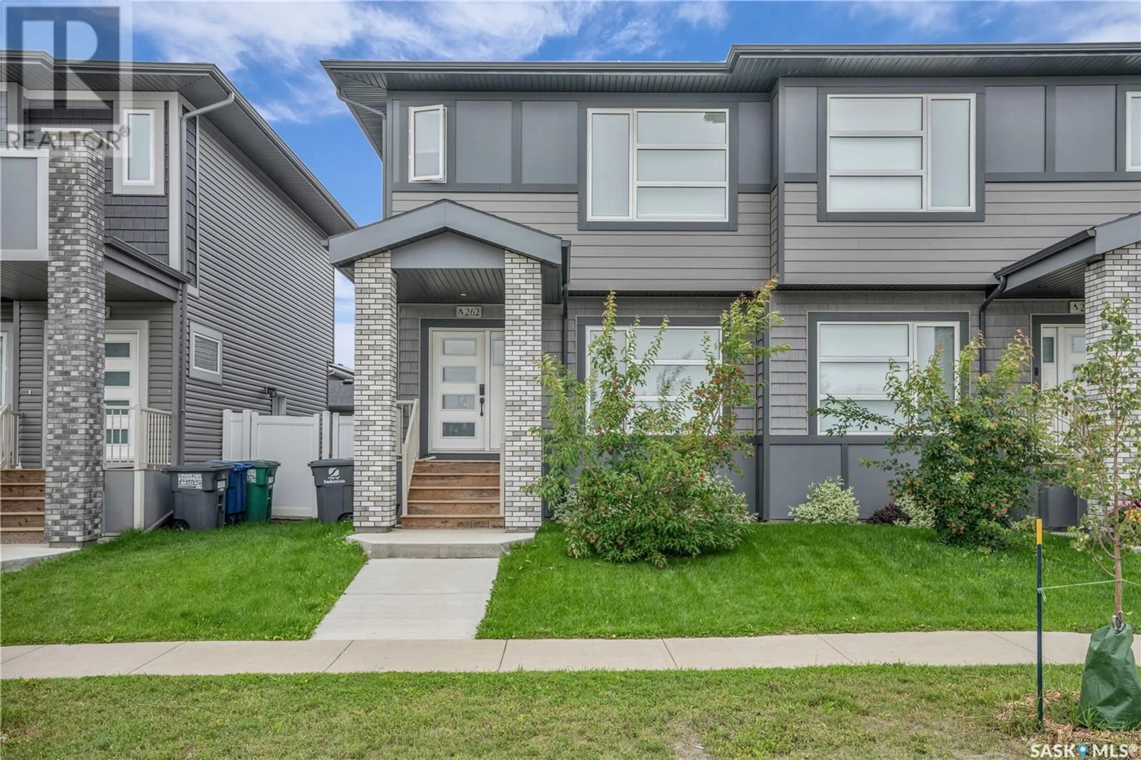 Home with vinyl exterior material, street for 262 BRIGHTON BOULEVARD, Saskatoon Saskatchewan S7V0V8