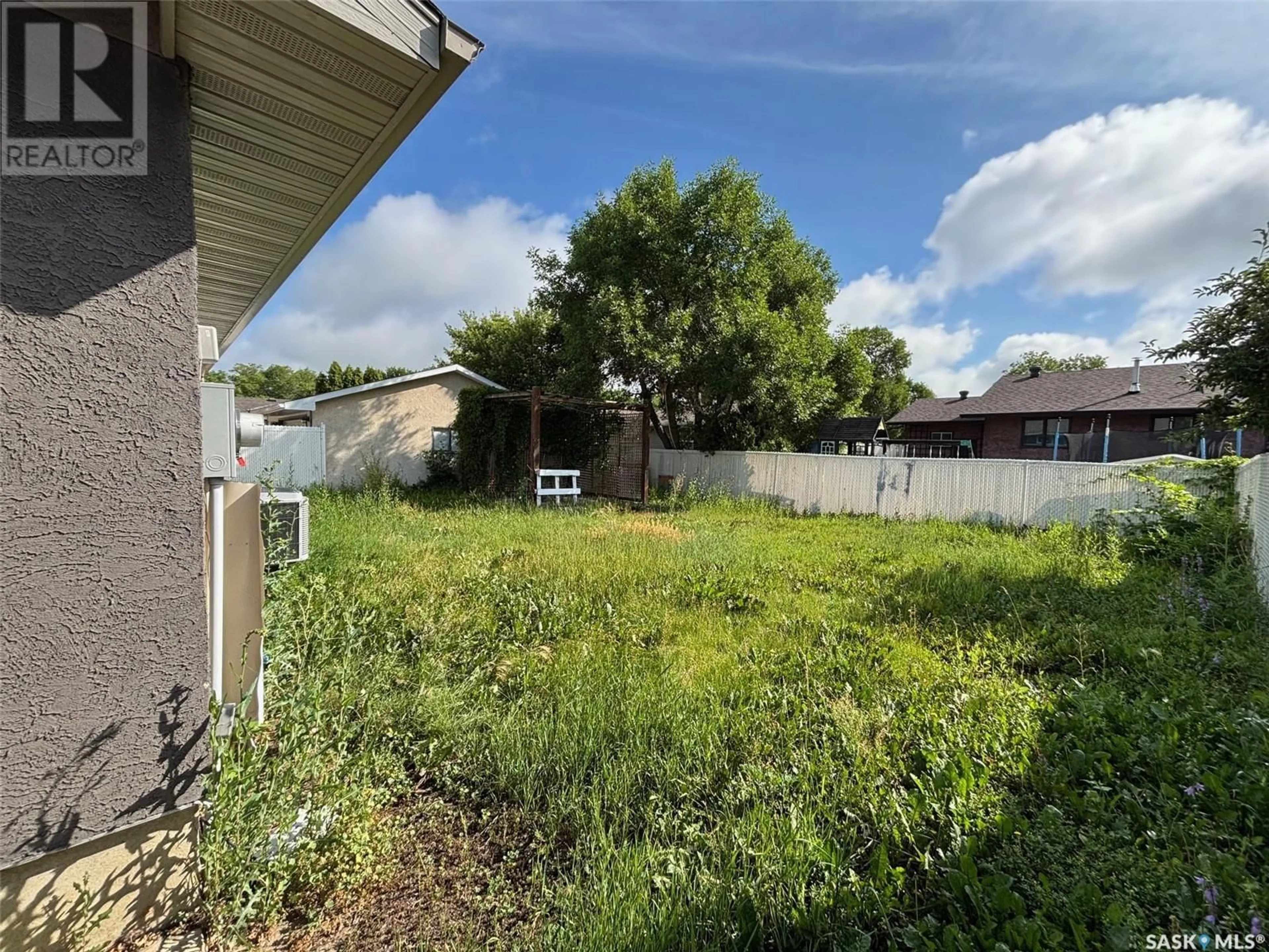 A pic from outside/outdoor area/front of a property/back of a property/a pic from drone, street for 211 UPLAND DRIVE, Regina Saskatchewan S4R6C6