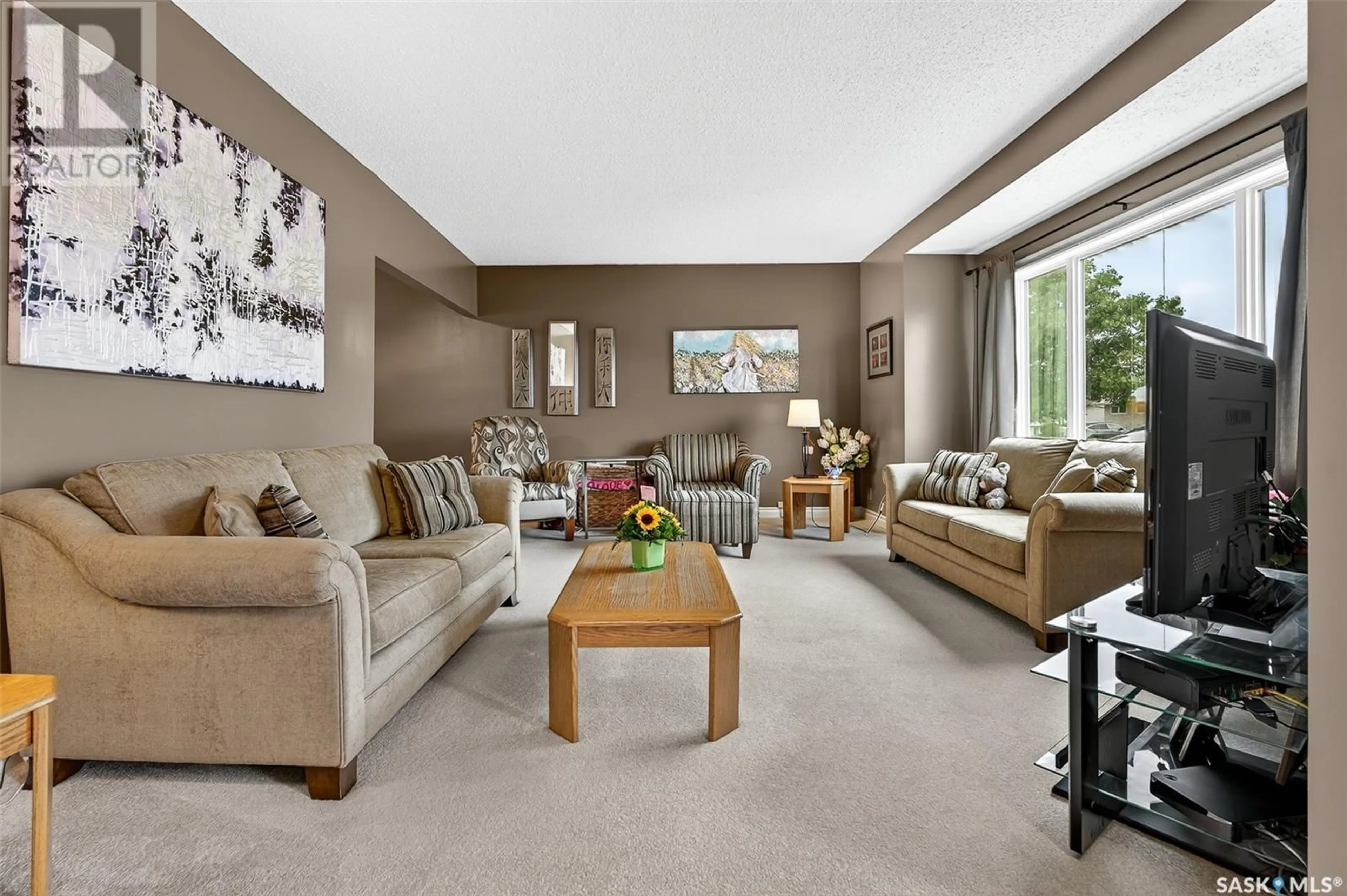 Living room with furniture, carpet floor for 1507 DUFFIELD STREET, Moose Jaw Saskatchewan S6H6P5