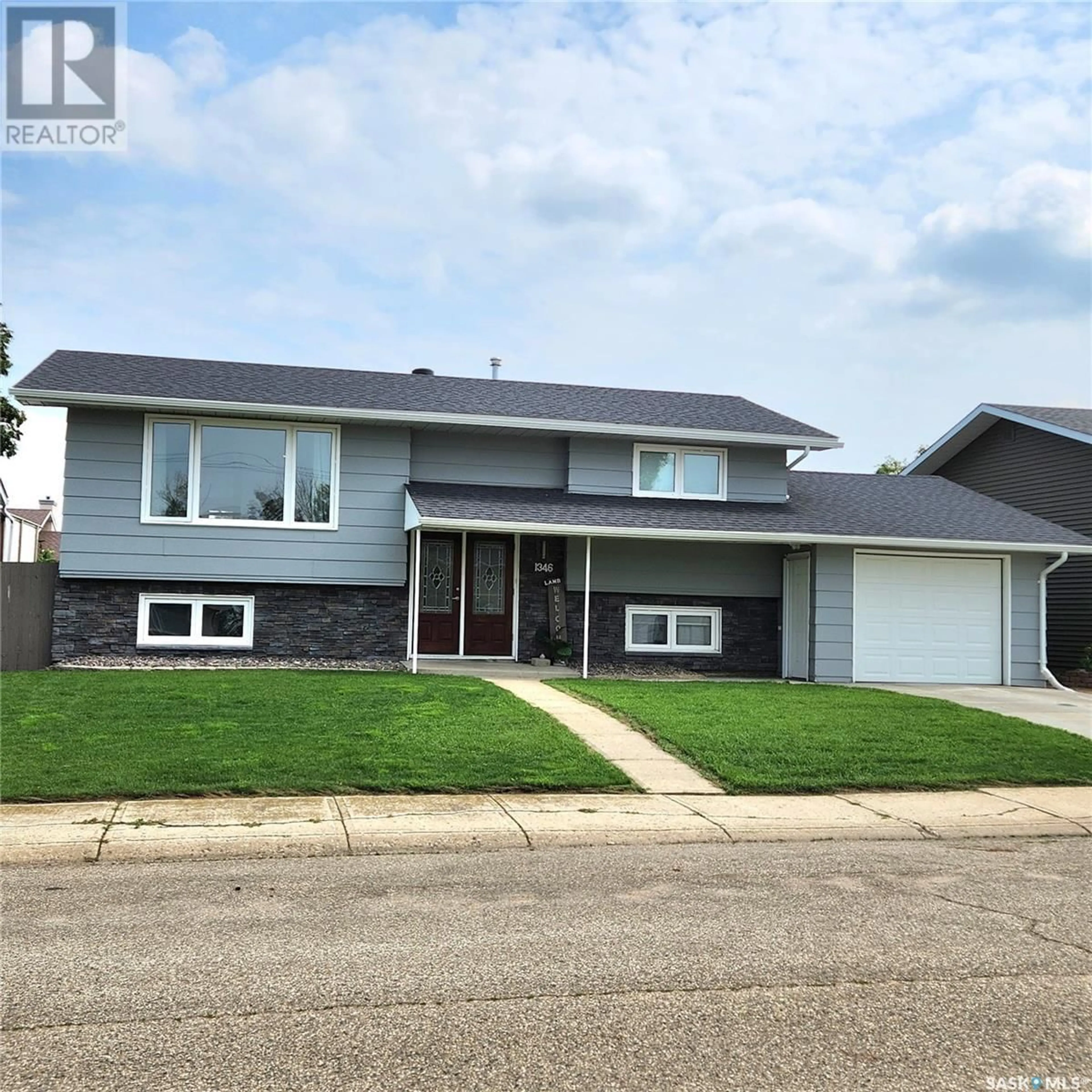 Home with vinyl exterior material, street for 1346 PRINCESS CRESCENT, Moose Jaw Saskatchewan S6H6S9