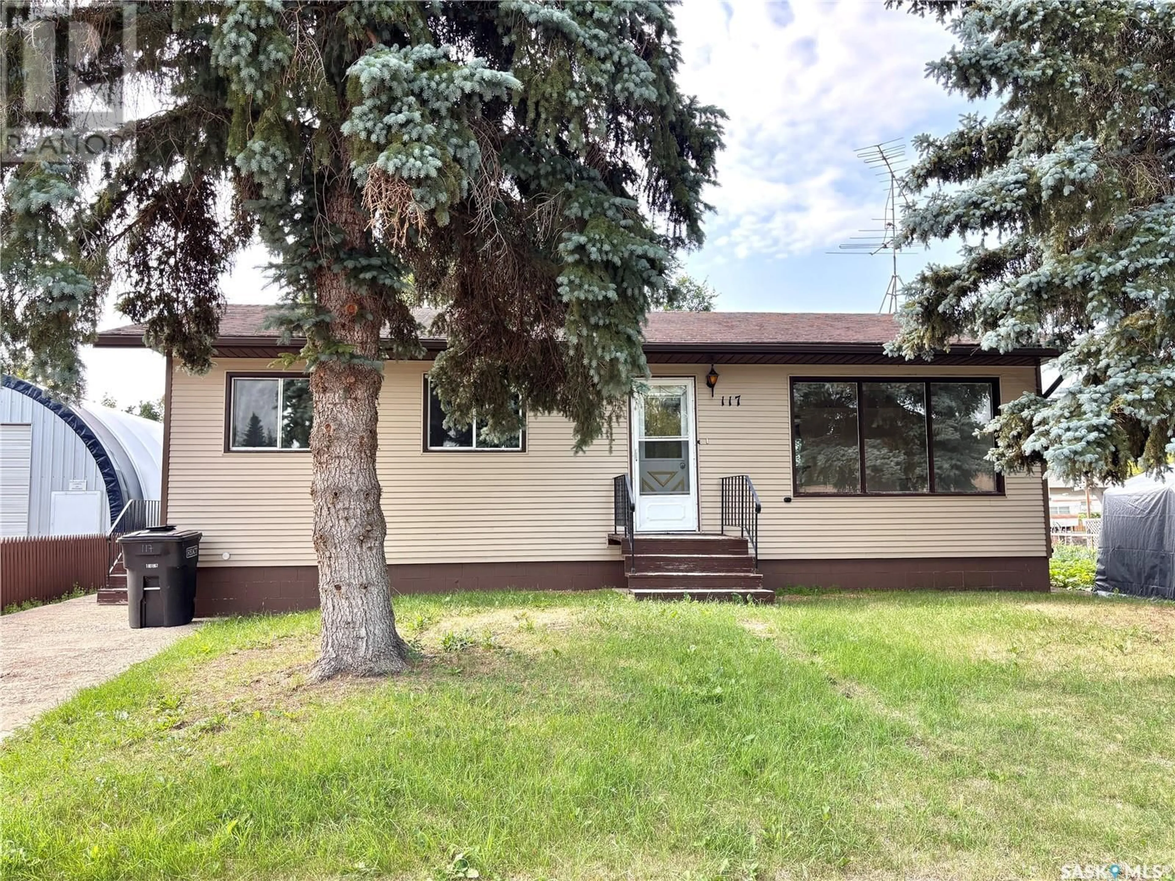 Home with vinyl exterior material, street for N - 117 2ND STREET, Wakaw Saskatchewan S0K4P0