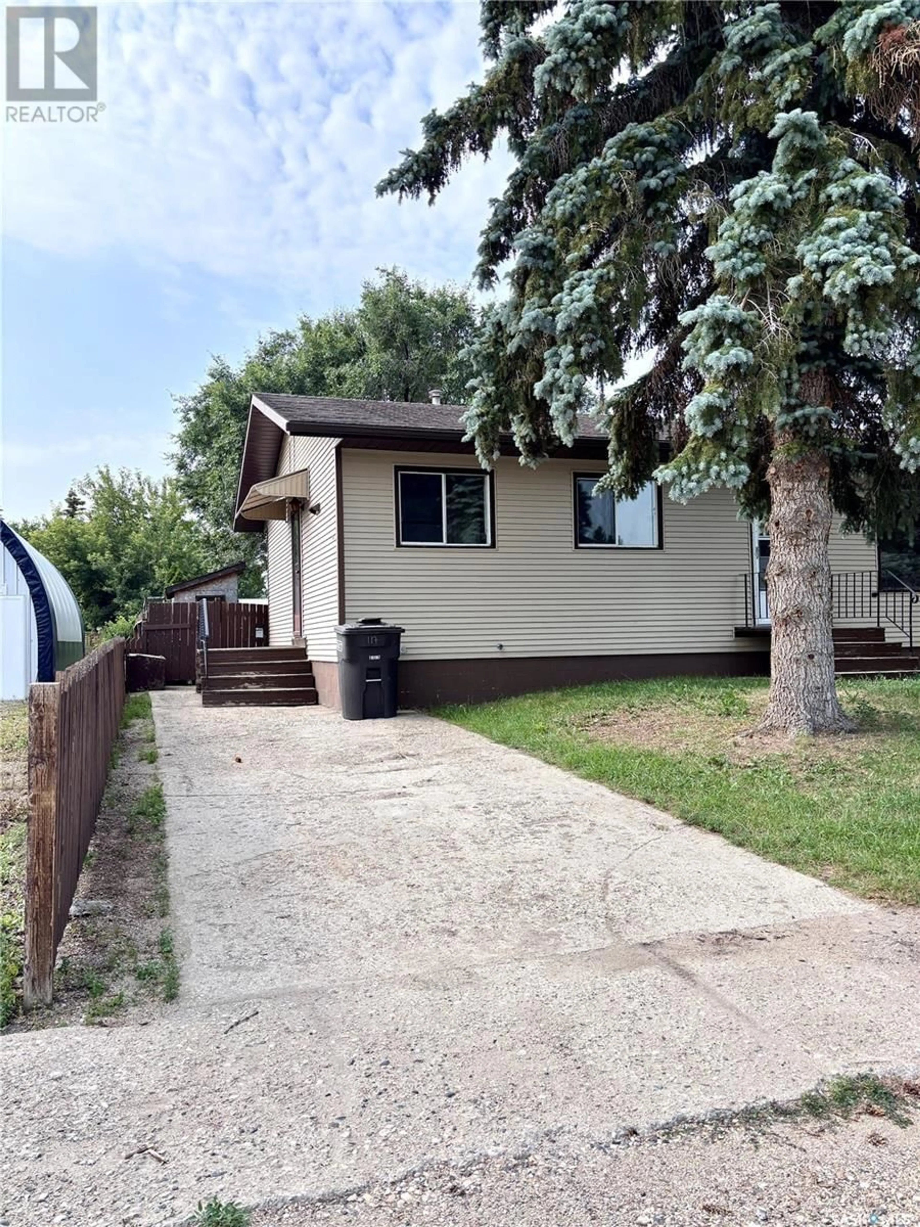 Home with vinyl exterior material, street for N - 117 2ND STREET, Wakaw Saskatchewan S0K4P0