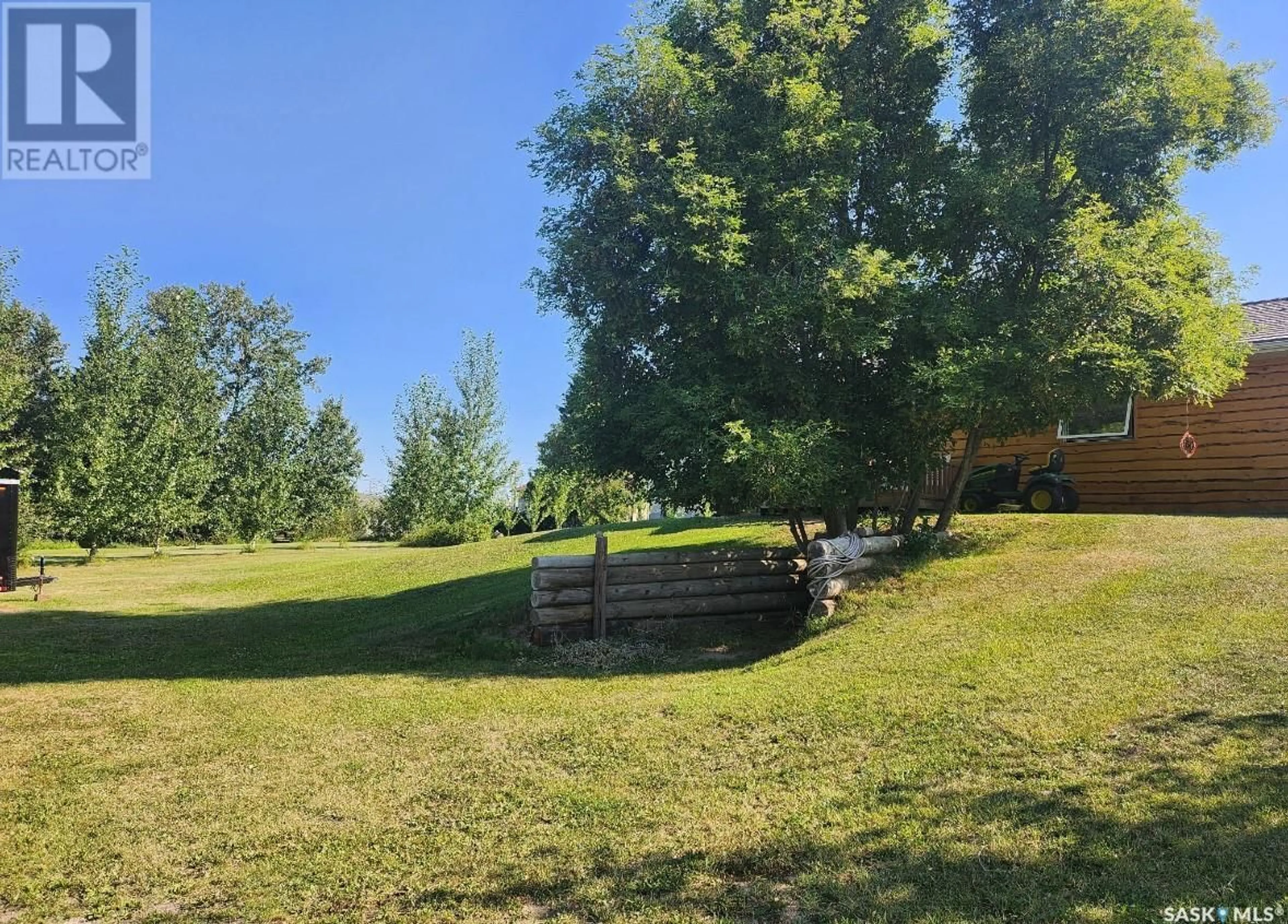 A pic from outside/outdoor area/front of a property/back of a property/a pic from drone, forest/trees view for 112 3RD AVENUE, Big River Saskatchewan S0J0E0