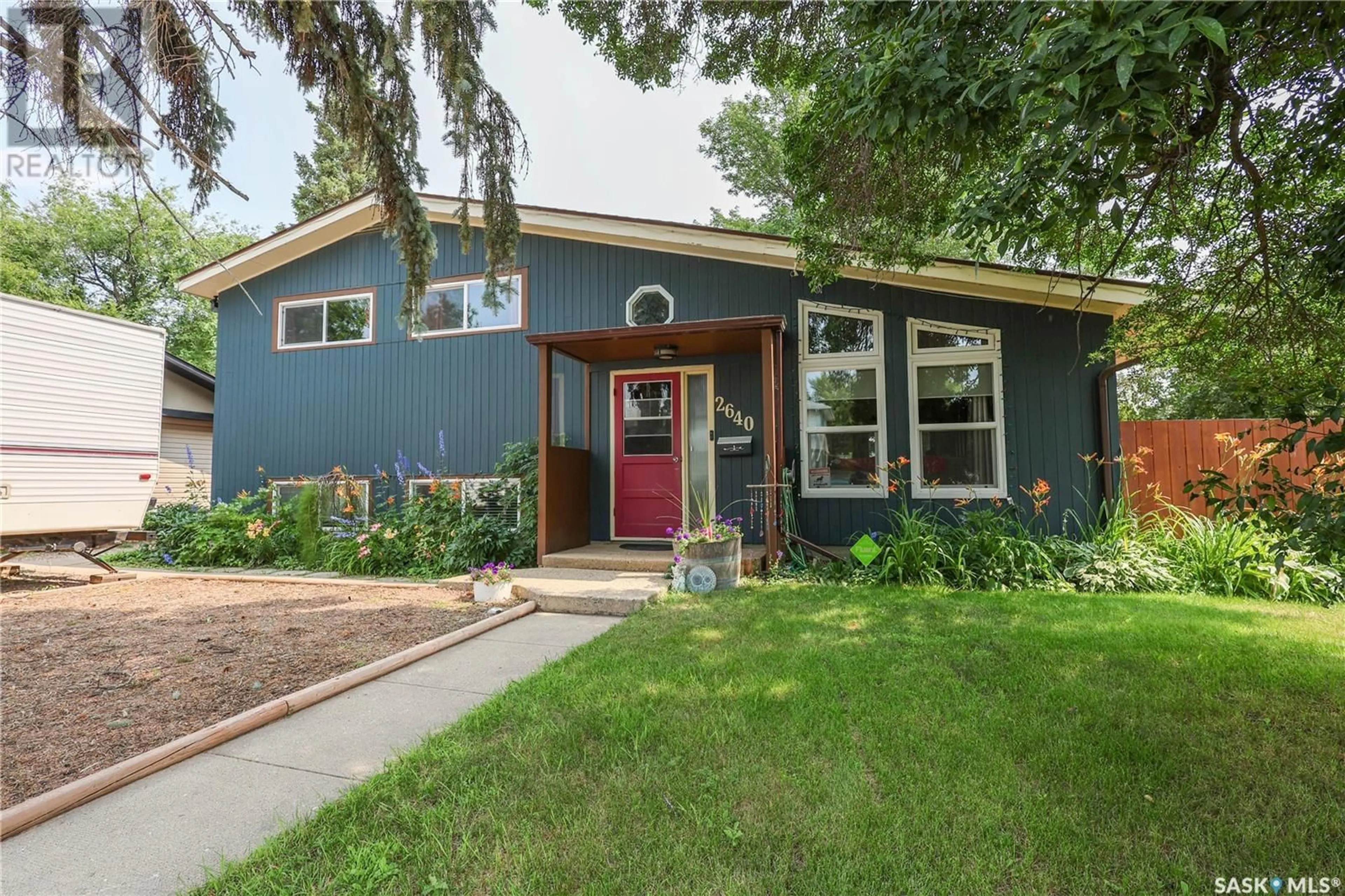 Home with vinyl exterior material, street for 2640 3RD AVENUE, Prince Albert Saskatchewan S6V2G4