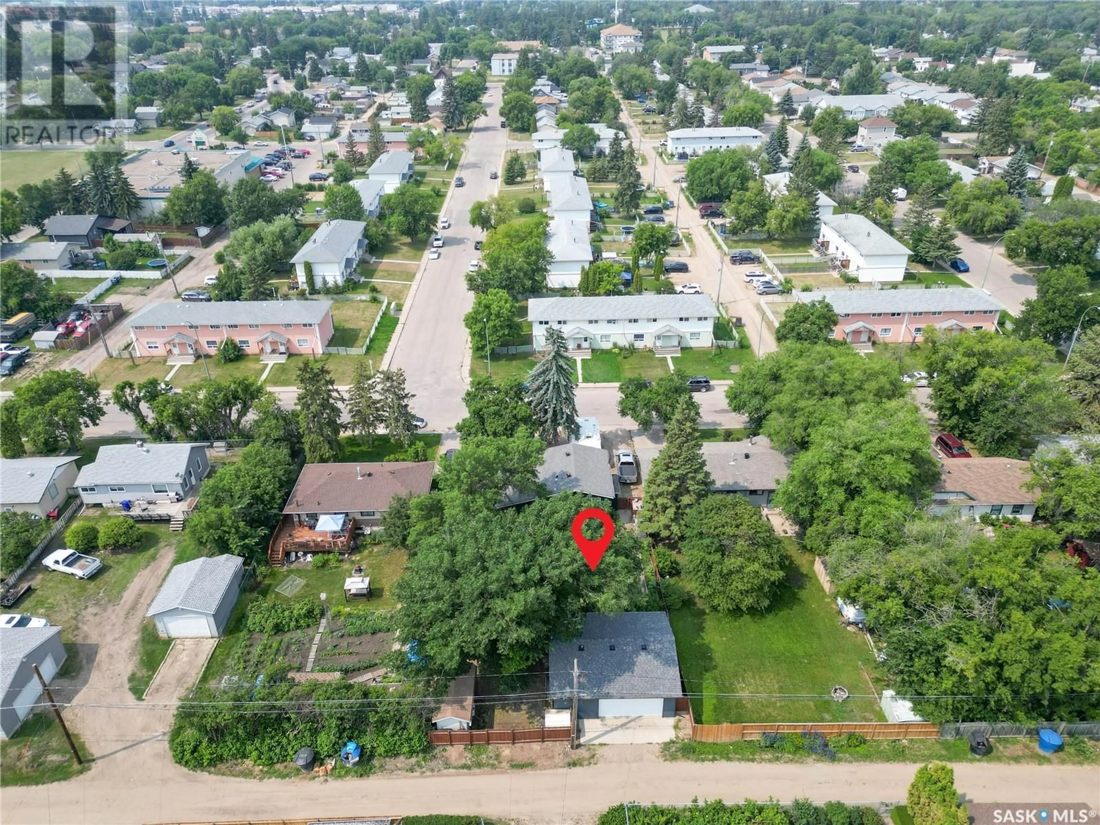 A pic from outside/outdoor area/front of a property/back of a property/a pic from drone, street for 2640 3RD AVENUE, Prince Albert Saskatchewan S6V2G4