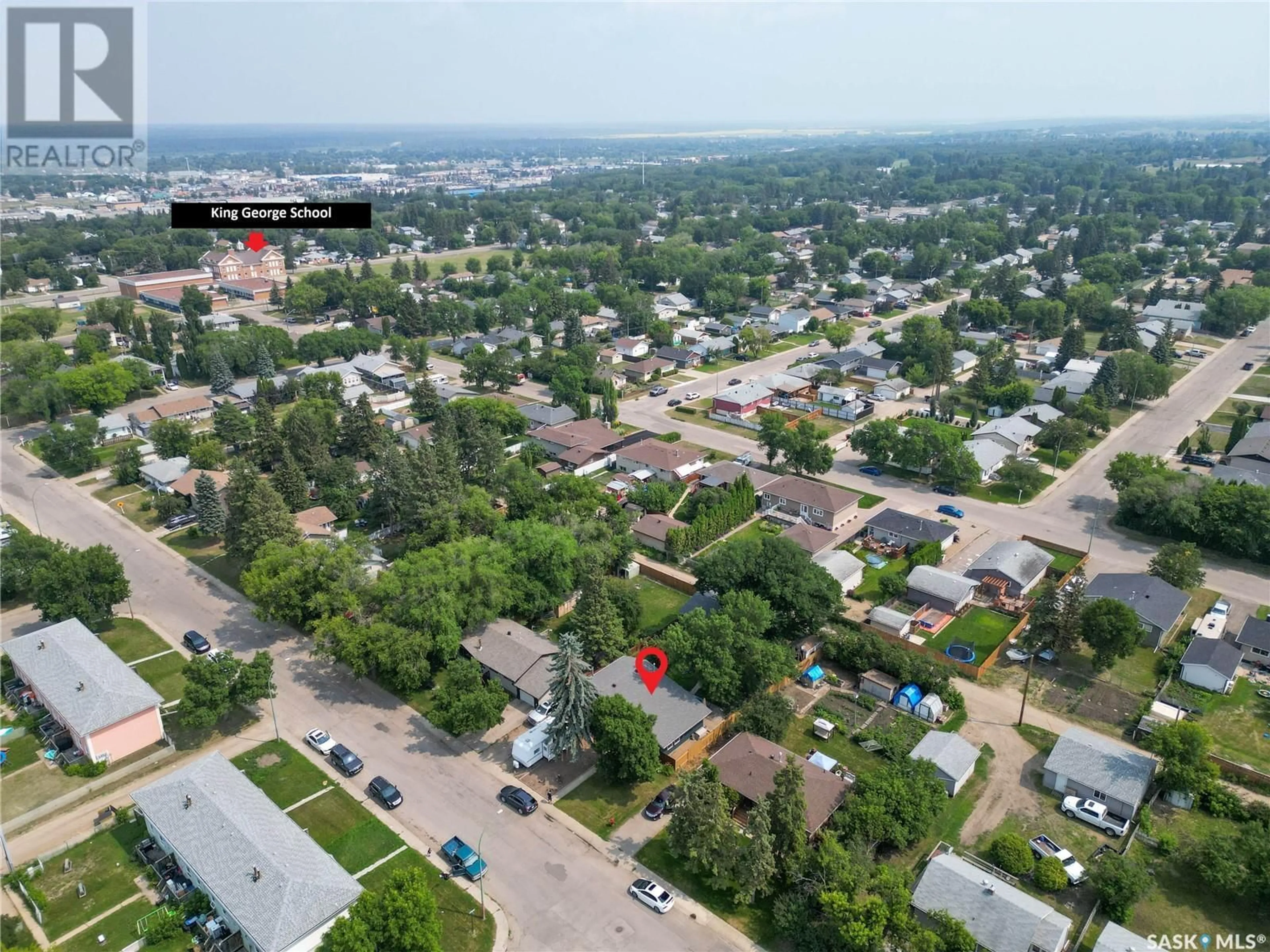 A pic from outside/outdoor area/front of a property/back of a property/a pic from drone, street for 2640 3RD AVENUE, Prince Albert Saskatchewan S6V2G4