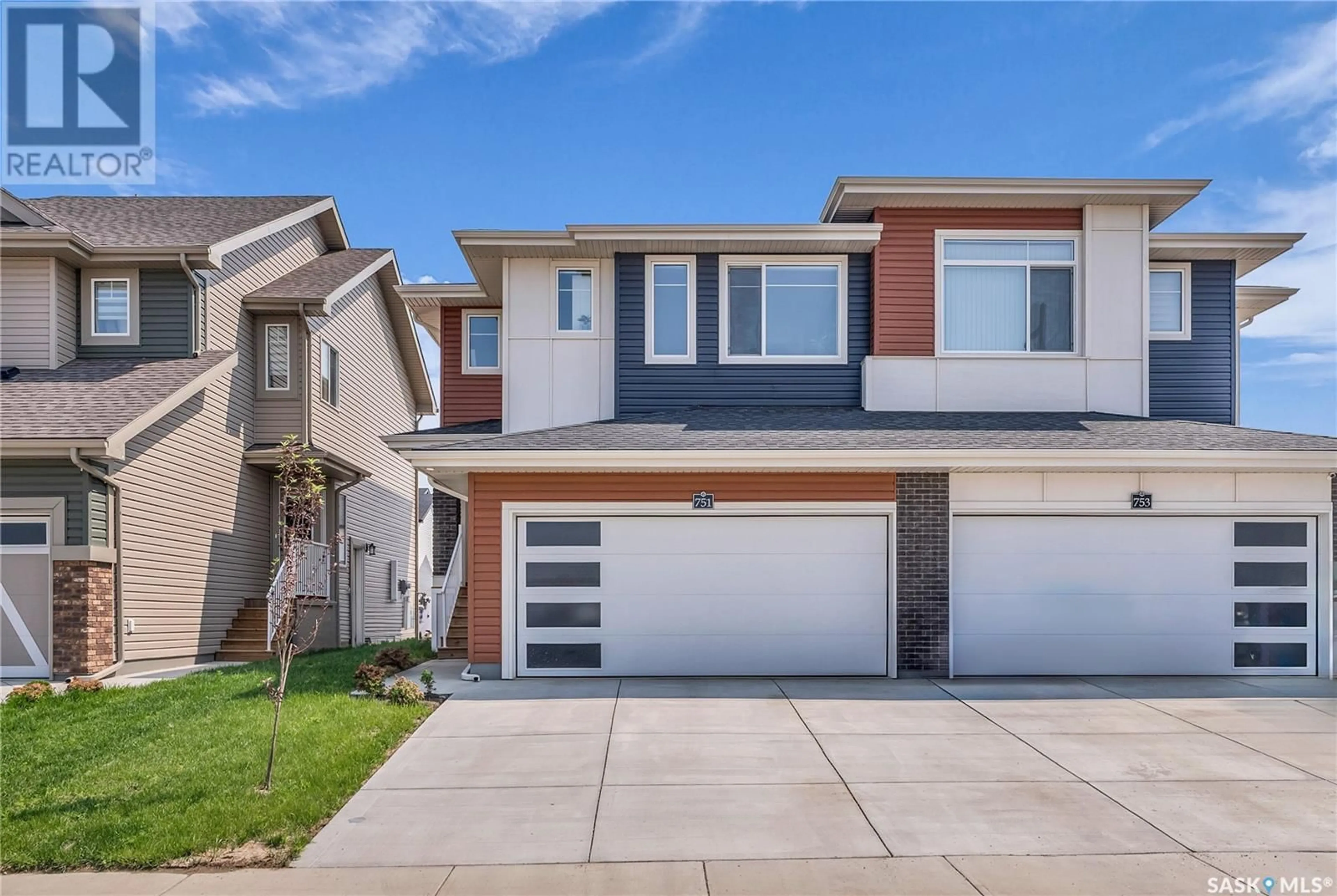 Home with vinyl exterior material, street for 751 BRIGHTON BOULEVARD, Saskatoon Saskatchewan S7V1P6