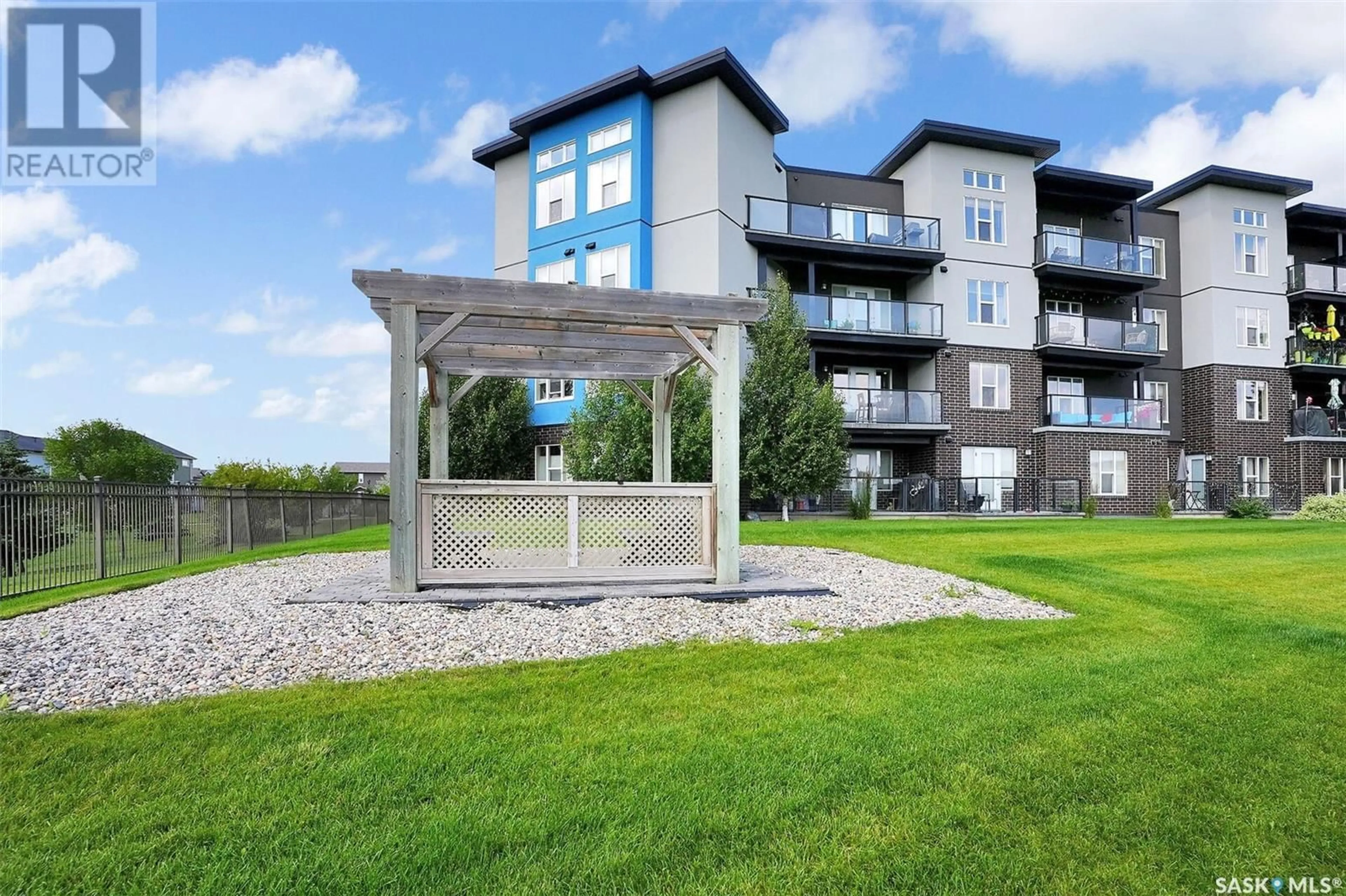 Patio, water/lake/river/ocean view for 212 5303 UNIVERSAL CRESCENT, Regina Saskatchewan S4W0L1