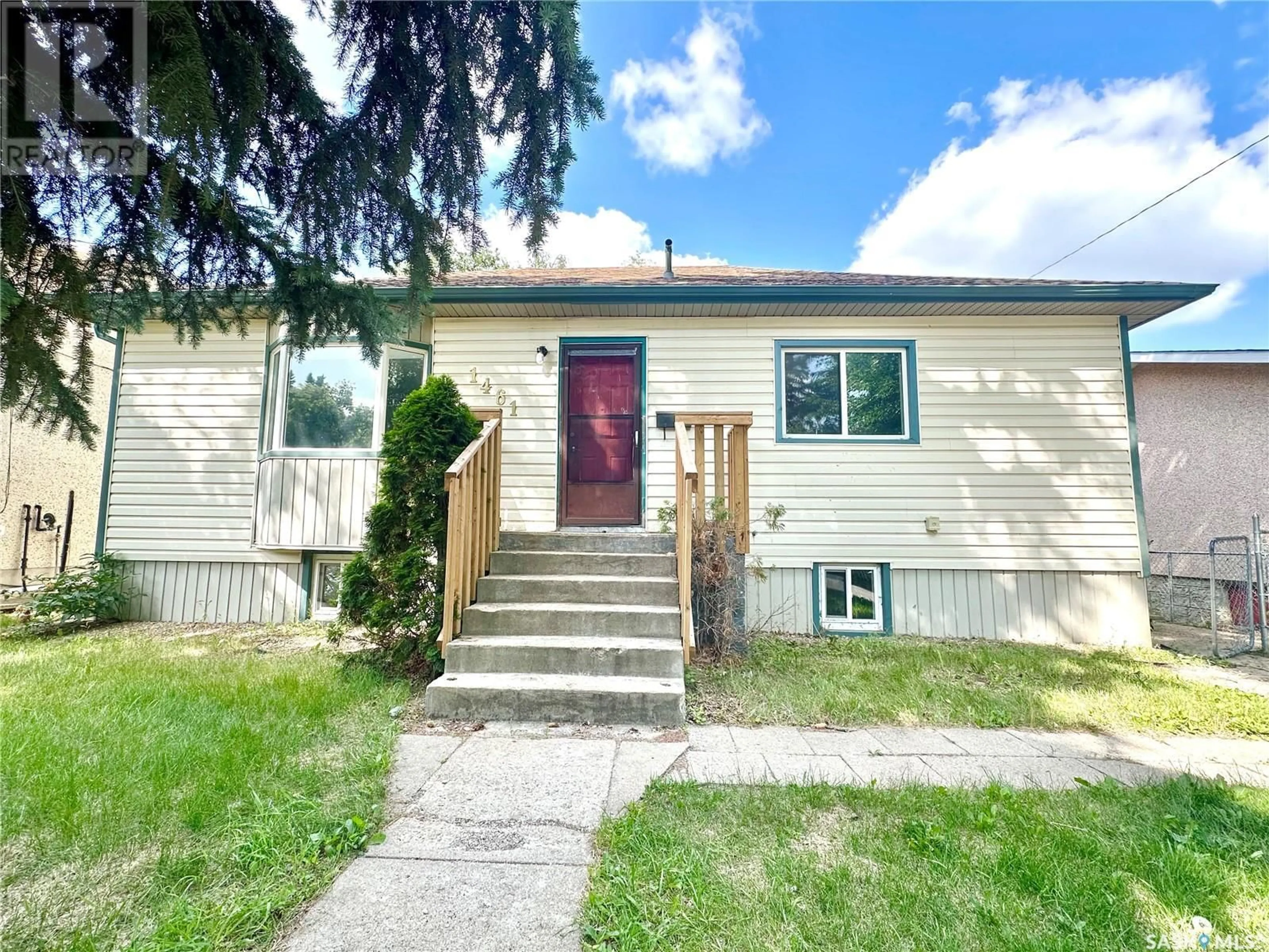 Home with vinyl exterior material, street for 1461 106TH STREET, North Battleford Saskatchewan S9A1X5