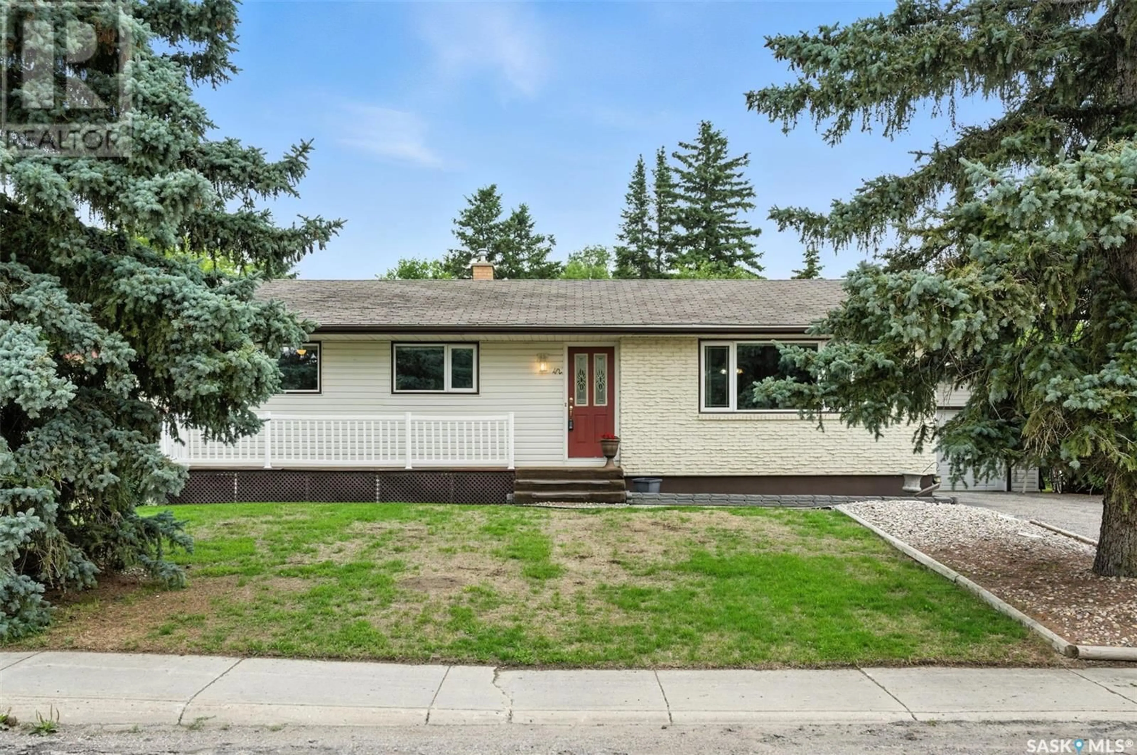 Home with vinyl exterior material, street for 42 CALVERT CRESCENT, Lanigan Saskatchewan S0K2M0