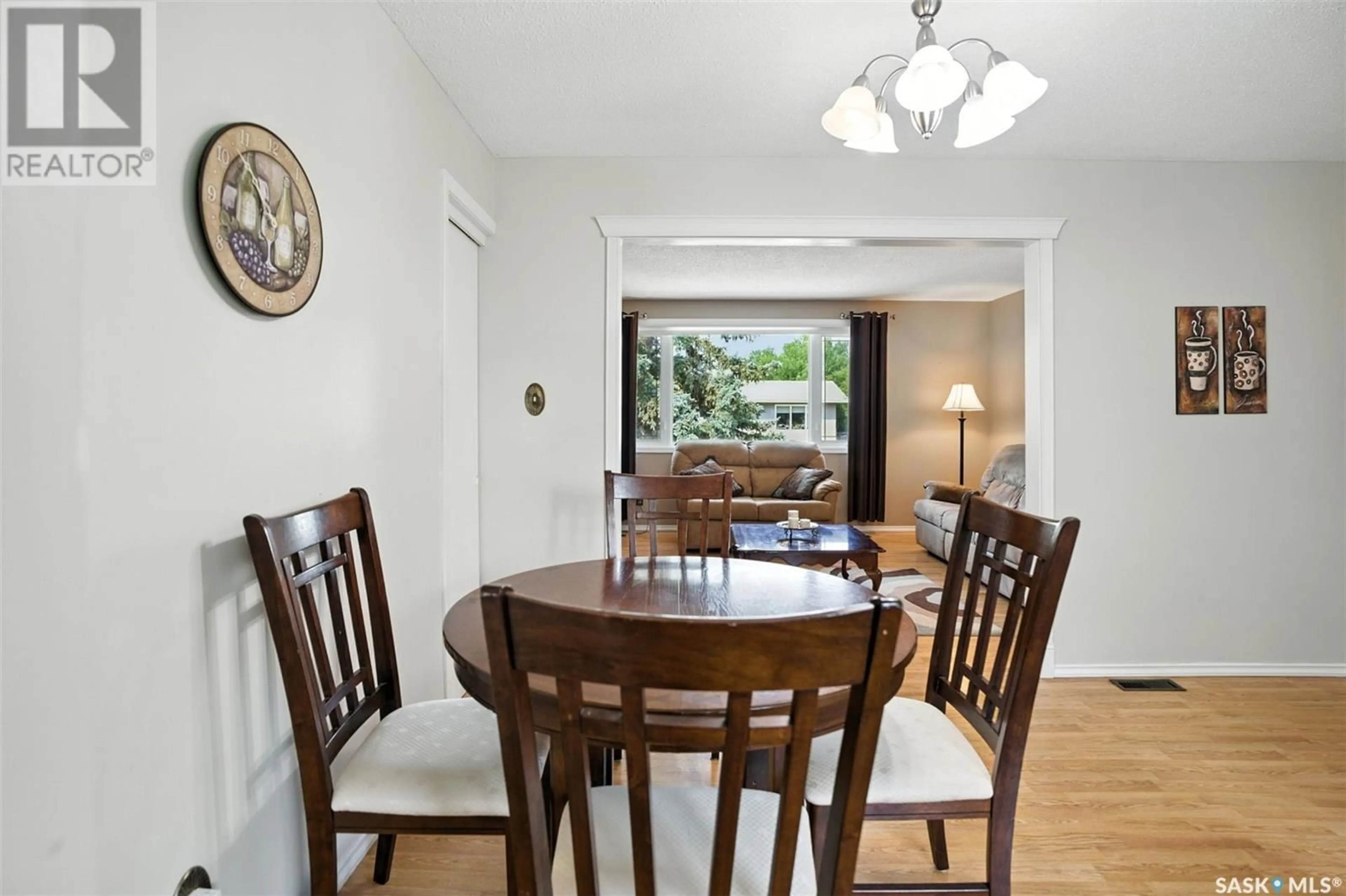 Dining room, wood/laminate floor for 42 CALVERT CRESCENT, Lanigan Saskatchewan S0K2M0