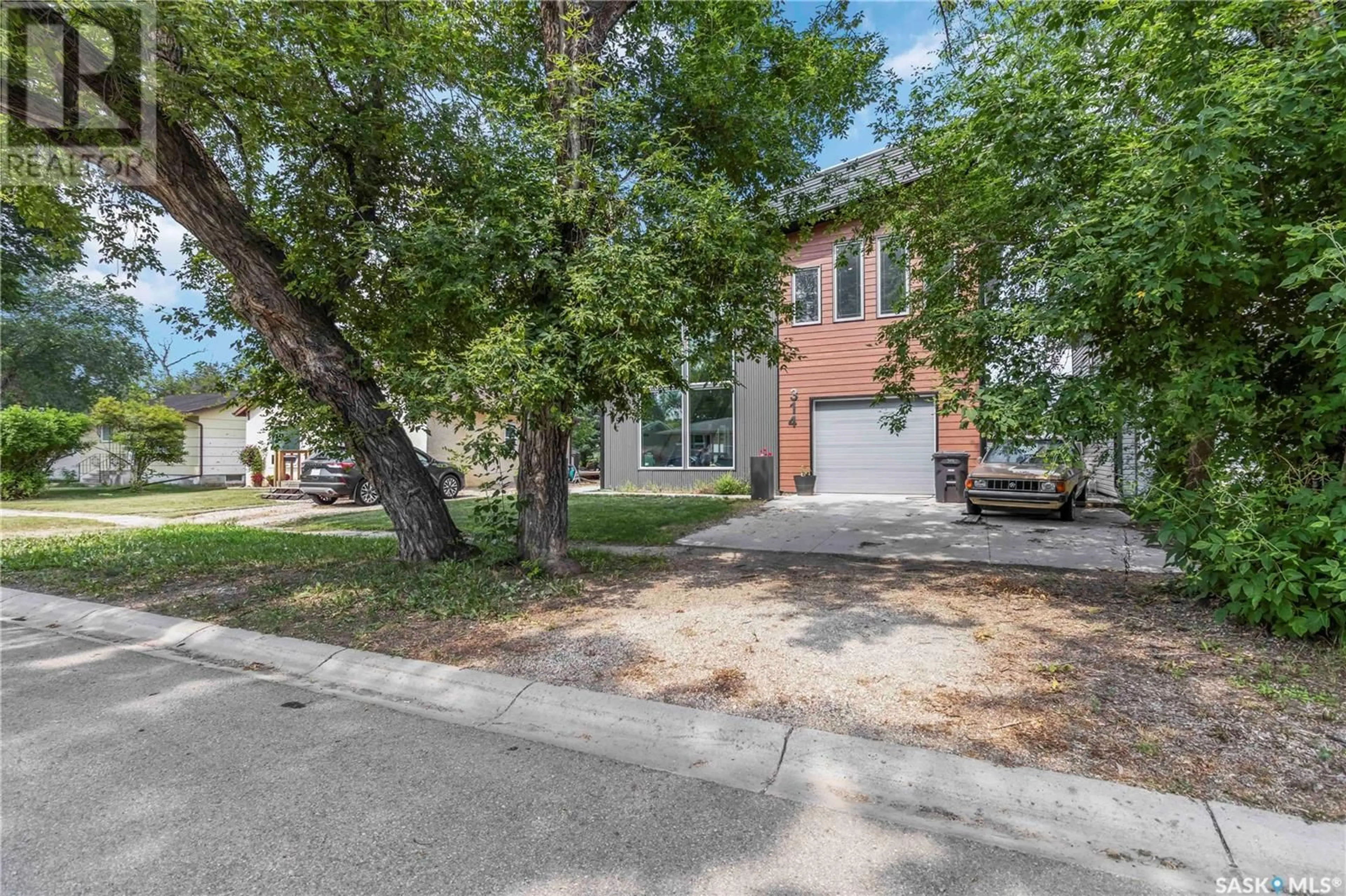 Home with brick exterior material, street for 314 FIFTH AVENUE, Watrous Saskatchewan S0K4T0