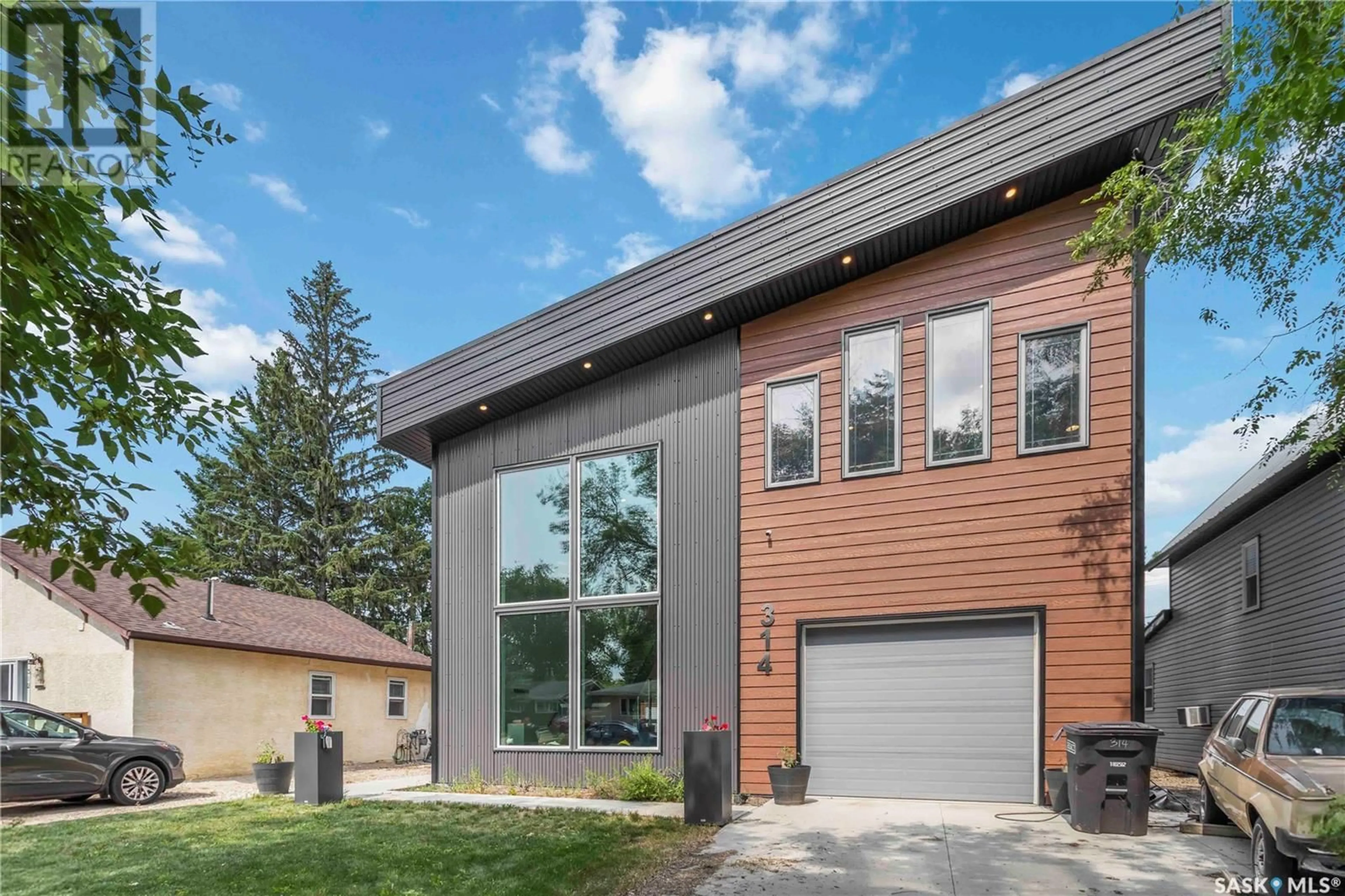 Home with brick exterior material, street for 314 FIFTH AVENUE, Watrous Saskatchewan S0K4T0