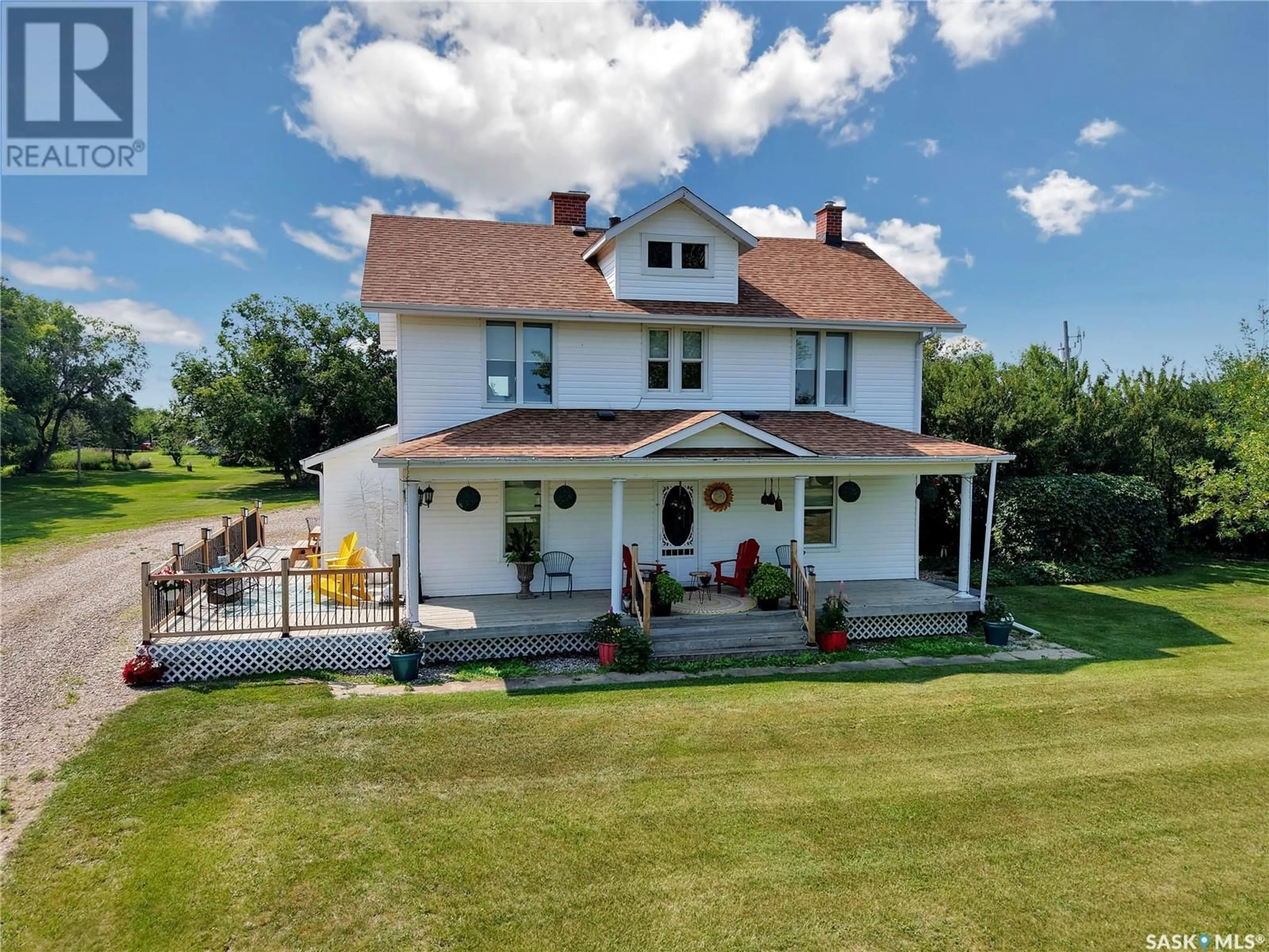 A pic from outside/outdoor area/front of a property/back of a property/a pic from drone, building for WORTH ACREAGE, Vanscoy Rm No. 345 Saskatchewan S0L0P0