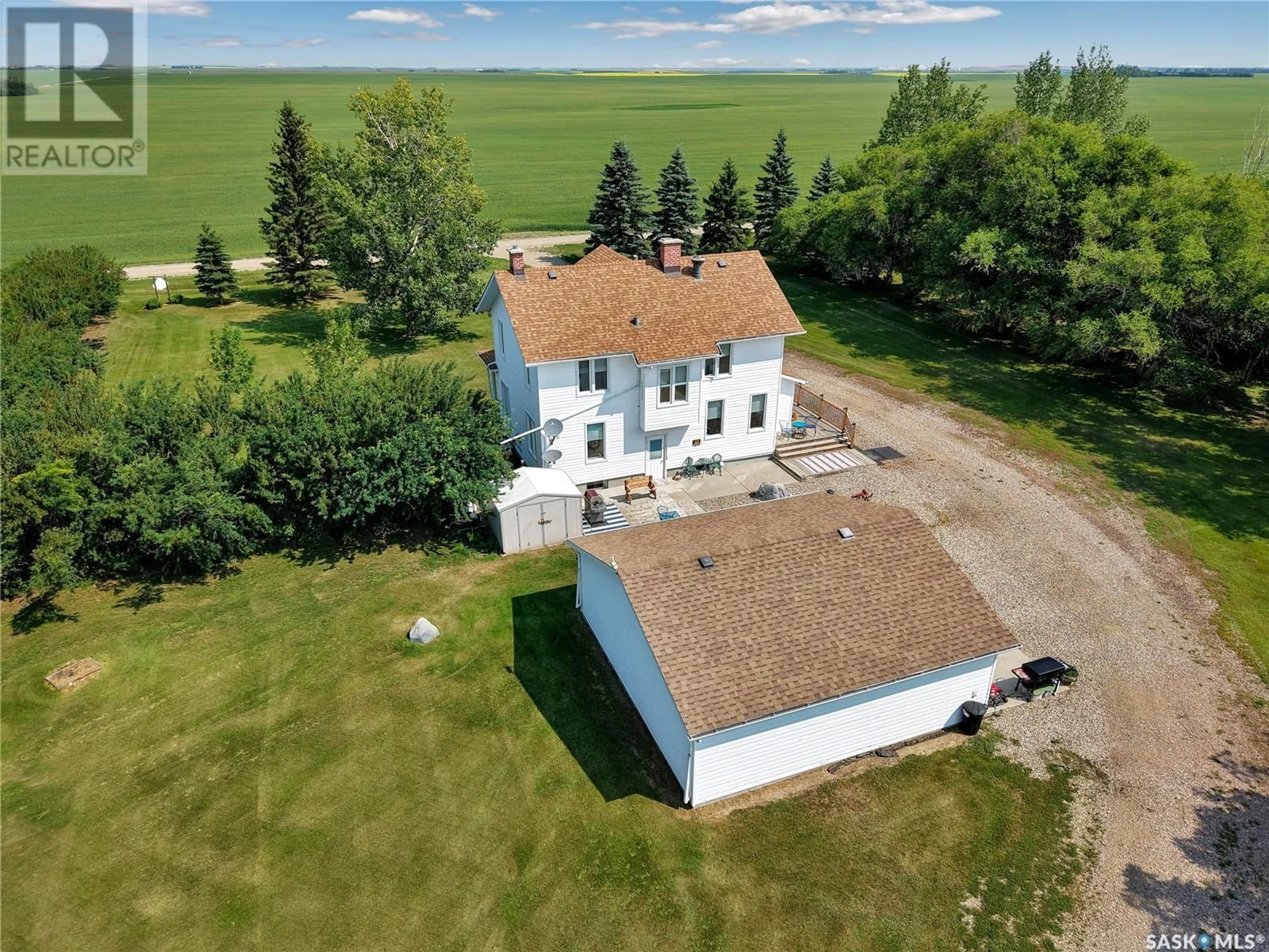 A pic from outside/outdoor area/front of a property/back of a property/a pic from drone, building for WORTH ACREAGE, Vanscoy Rm No. 345 Saskatchewan S0L0P0