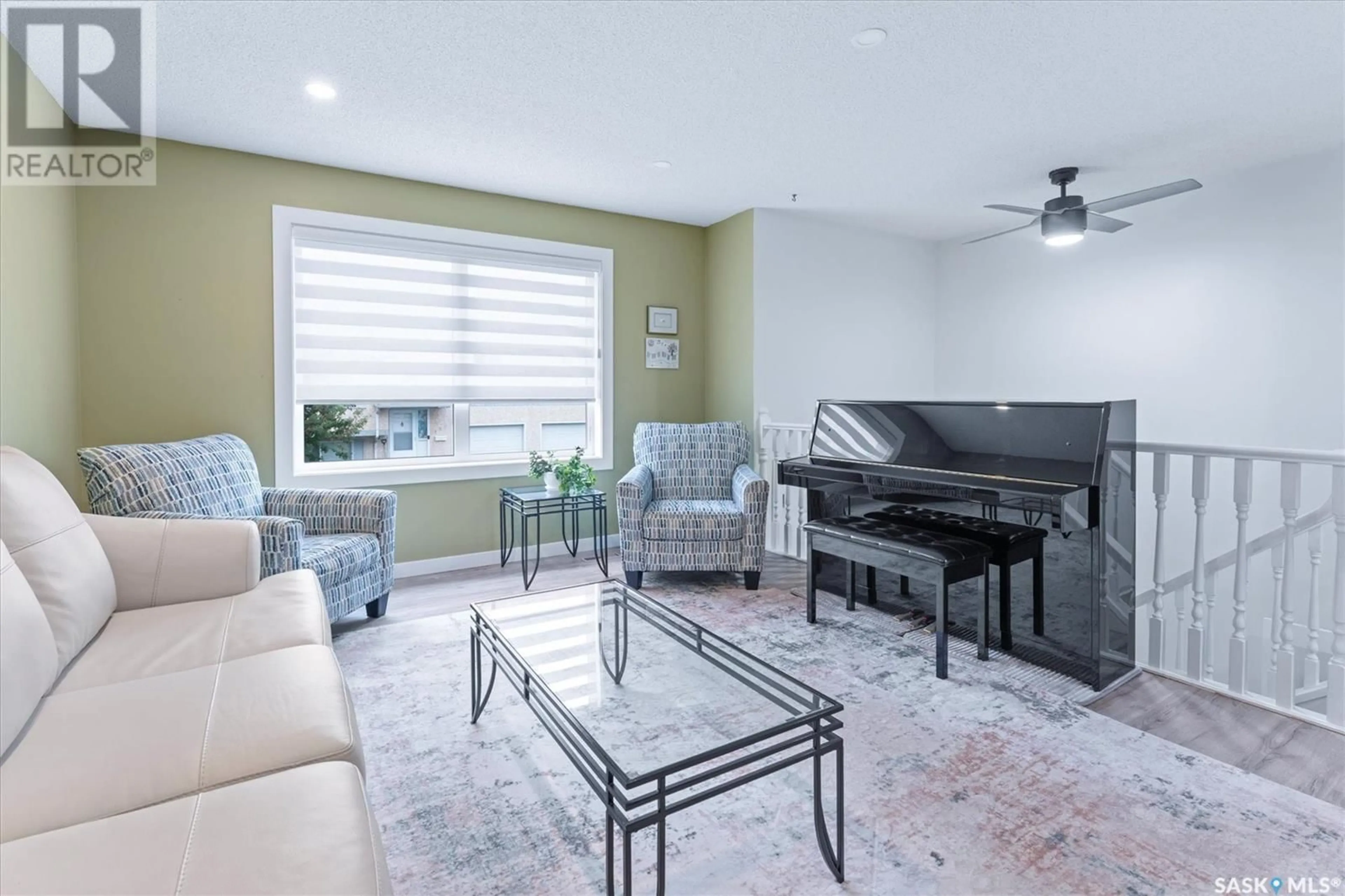 Living room with furniture, unknown for 506 510 PEREHUDOFF CRESCENT, Saskatoon Saskatchewan S7N4H6