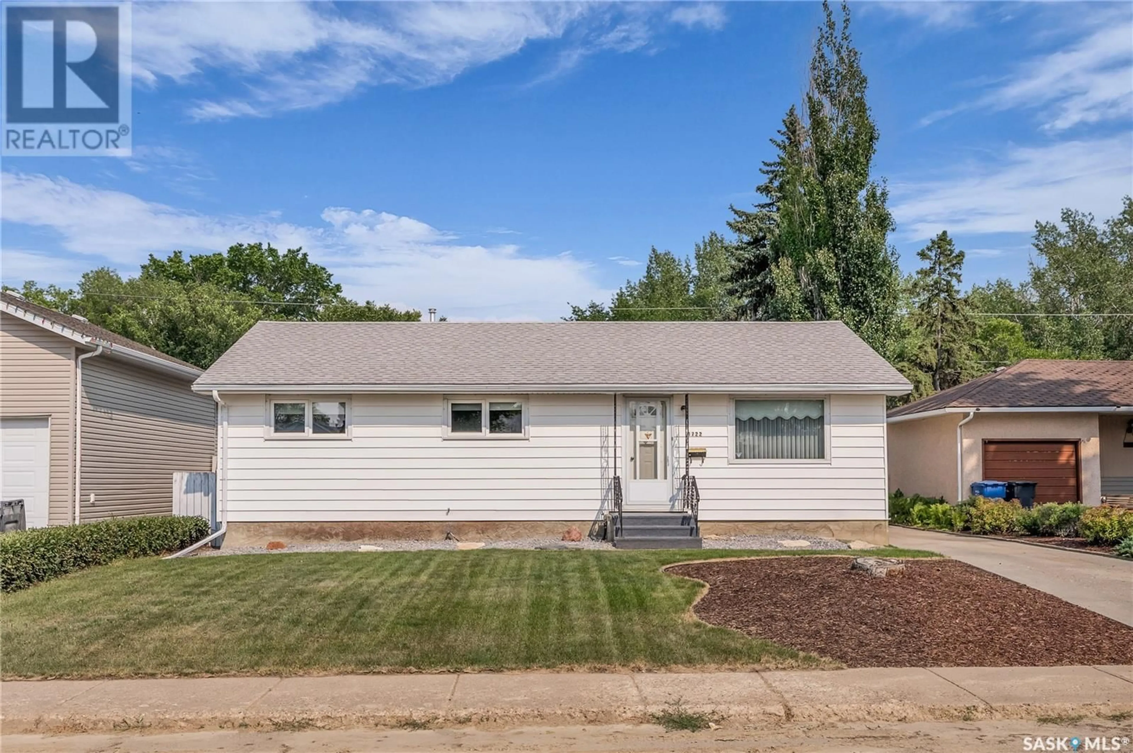 Home with vinyl exterior material, street for 1722 93RD STREET, North Battleford Saskatchewan S9A0C8